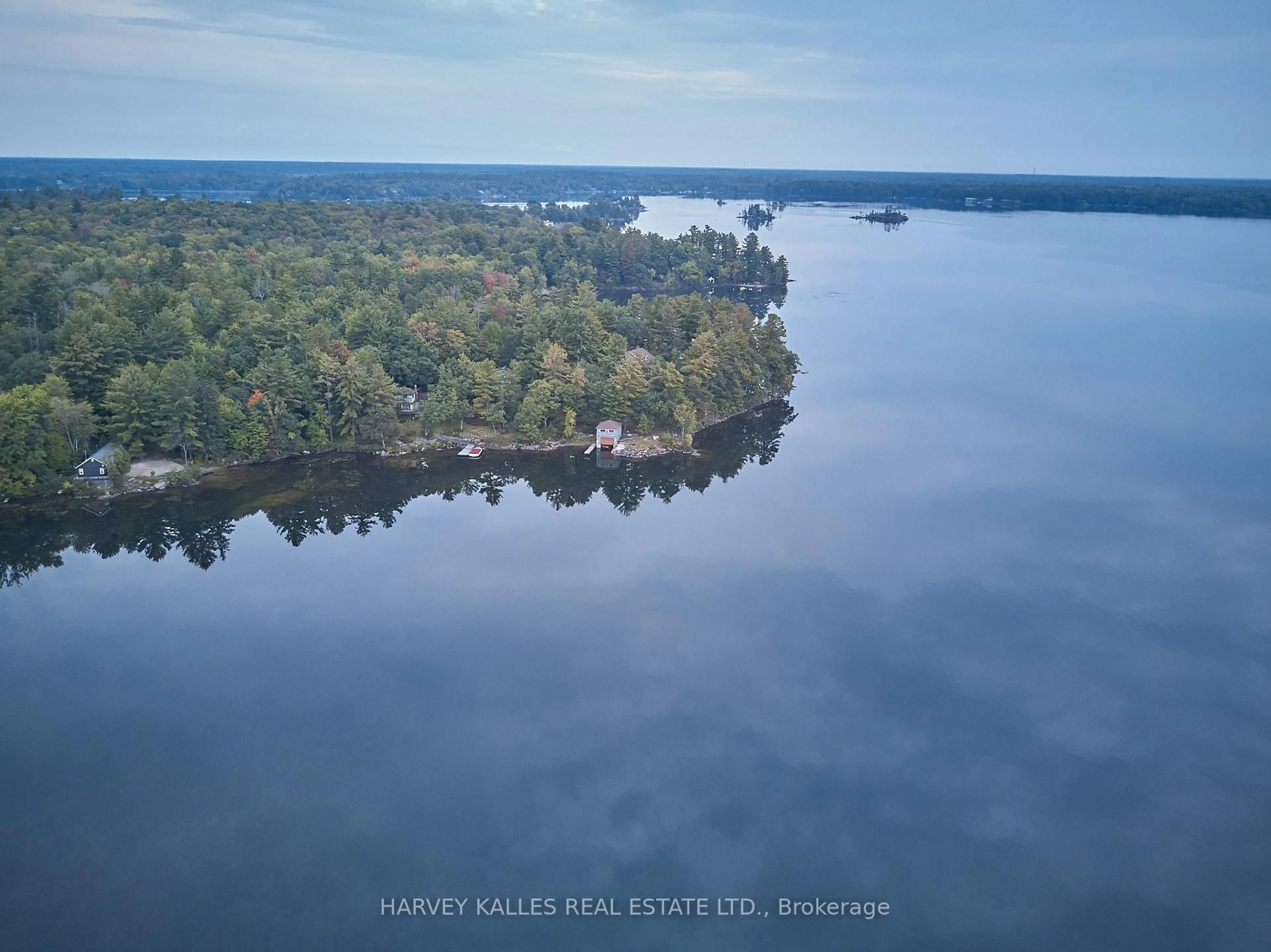 A pic from outside/outdoor area/front of a property/back of a property/a pic from drone, water/lake/river/ocean view for 1168 Apter Lane, Severn Ontario P0E 1N0