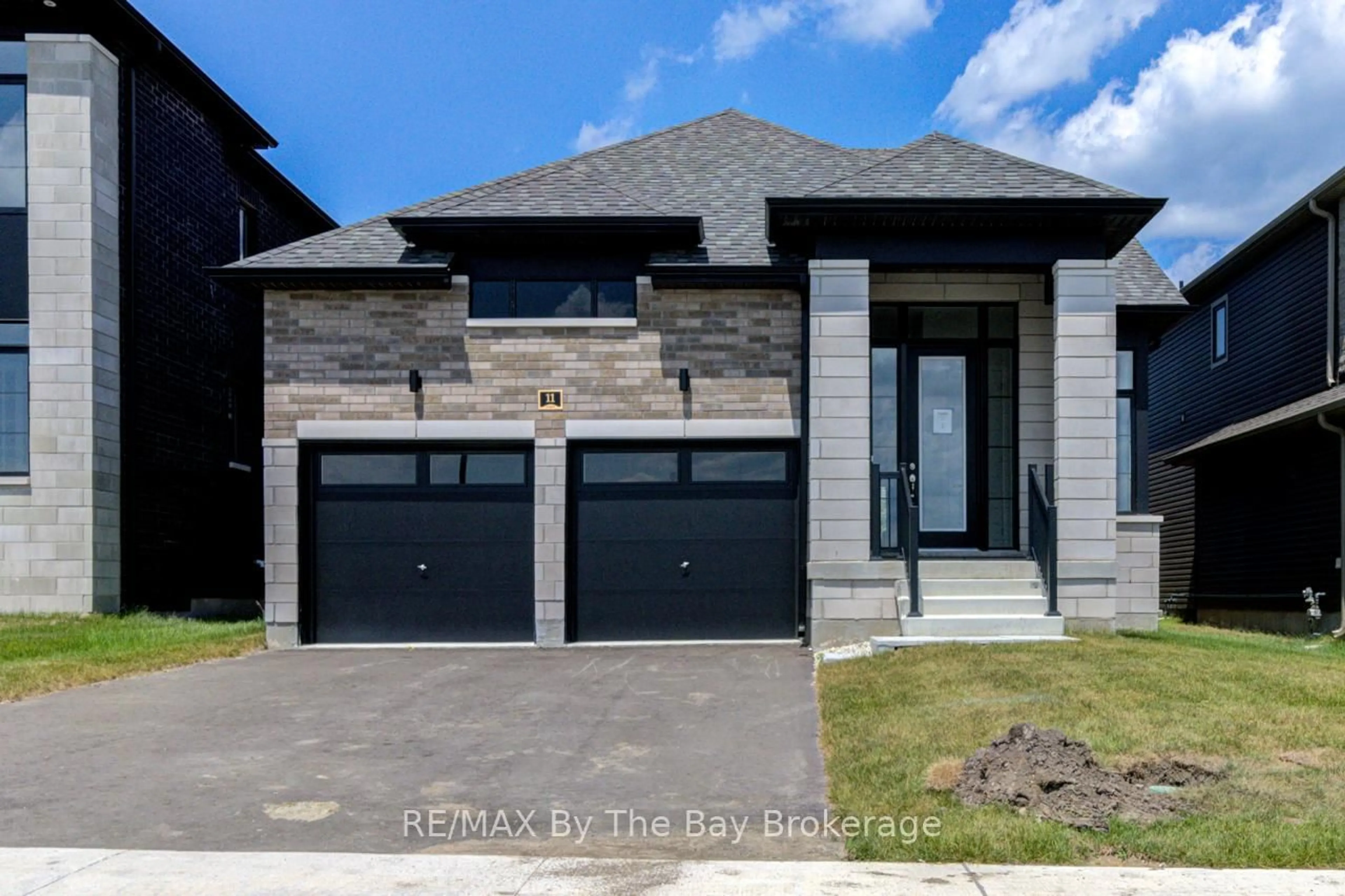 Home with brick exterior material, street for 11 Sun Valley Ave, Wasaga Beach Ontario L9Z 0N6