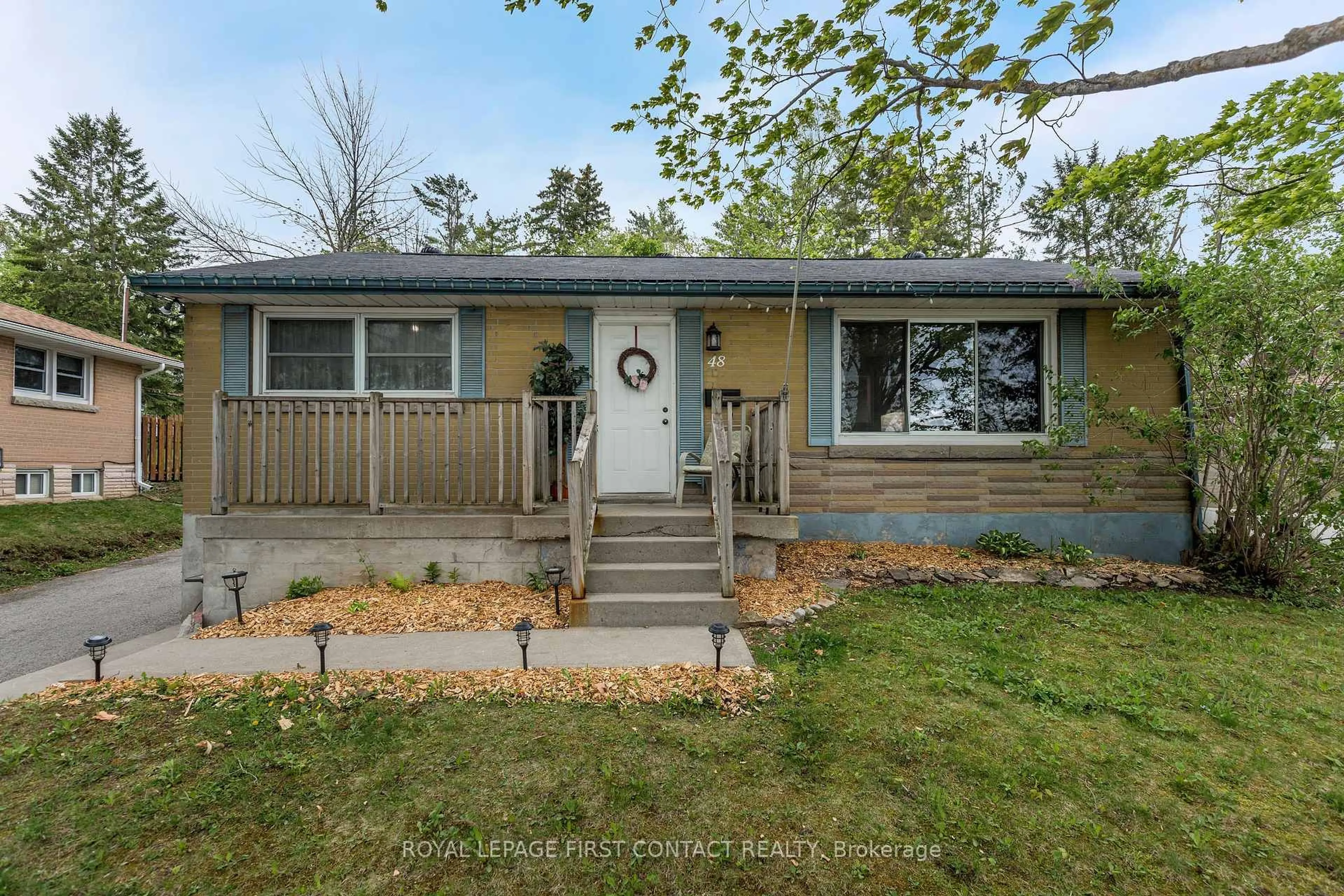Home with vinyl exterior material, street for 48 Brant St, Orillia Ontario L3V 3N7