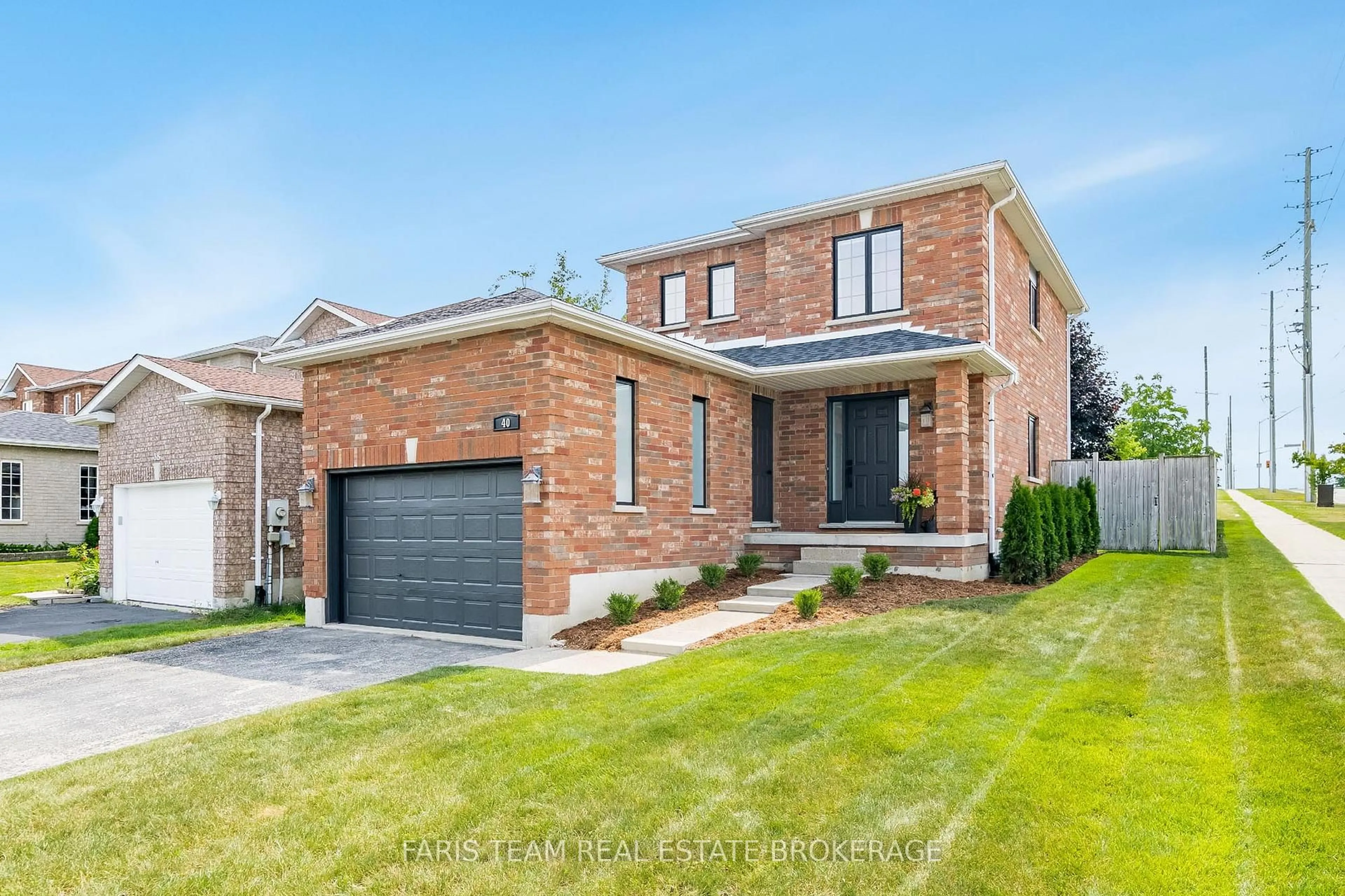 Home with brick exterior material, street for 40 Brown Wood Dr, Barrie Ontario L4M 6N5