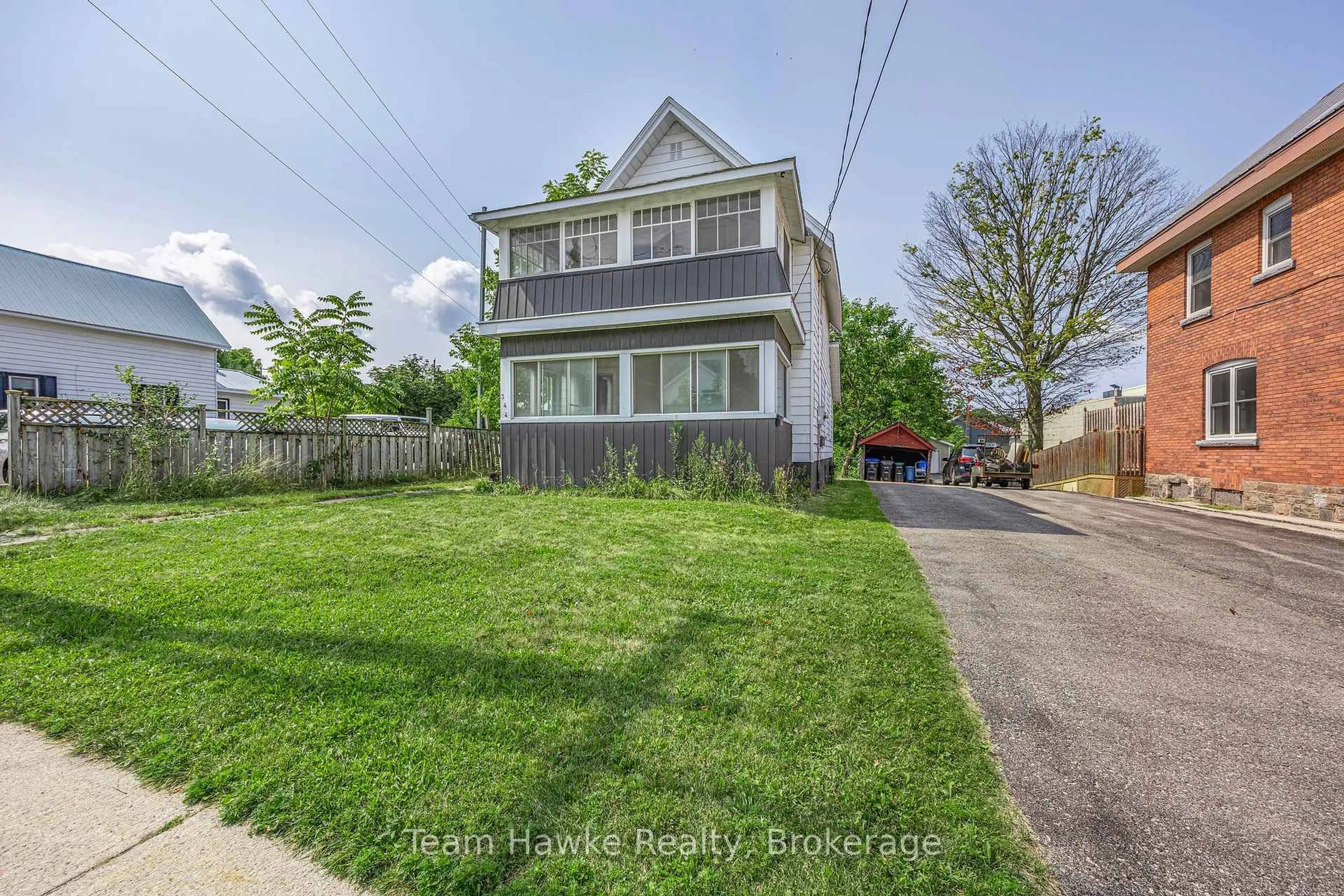 A pic from outside/outdoor area/front of a property/back of a property/a pic from drone, street for 344 Midland Ave, Midland Ontario L4R 3K7