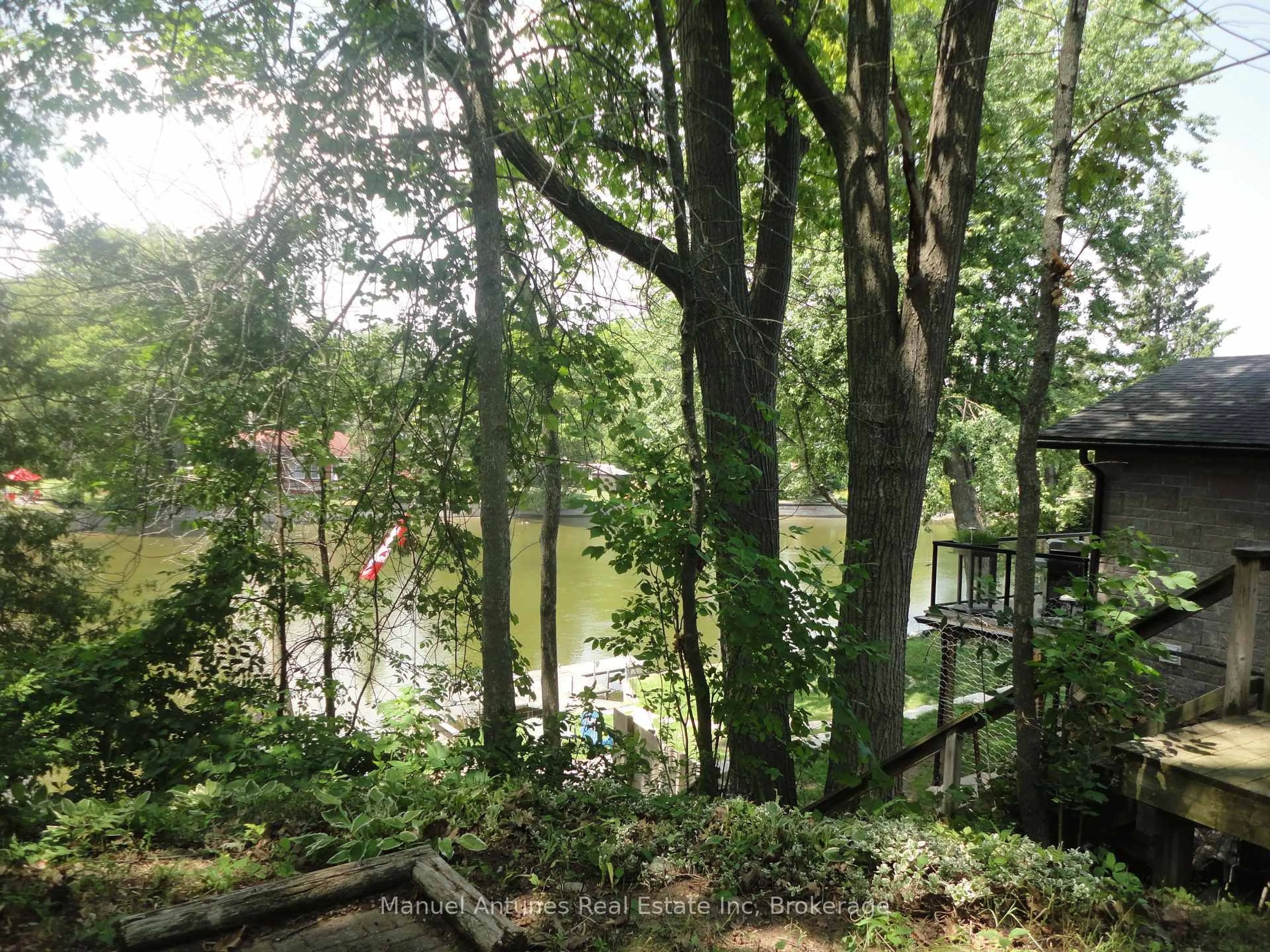 A pic from outside/outdoor area/front of a property/back of a property/a pic from drone, water/lake/river/ocean view for 114 32nd St, Wasaga Beach Ontario L9Z 2S4