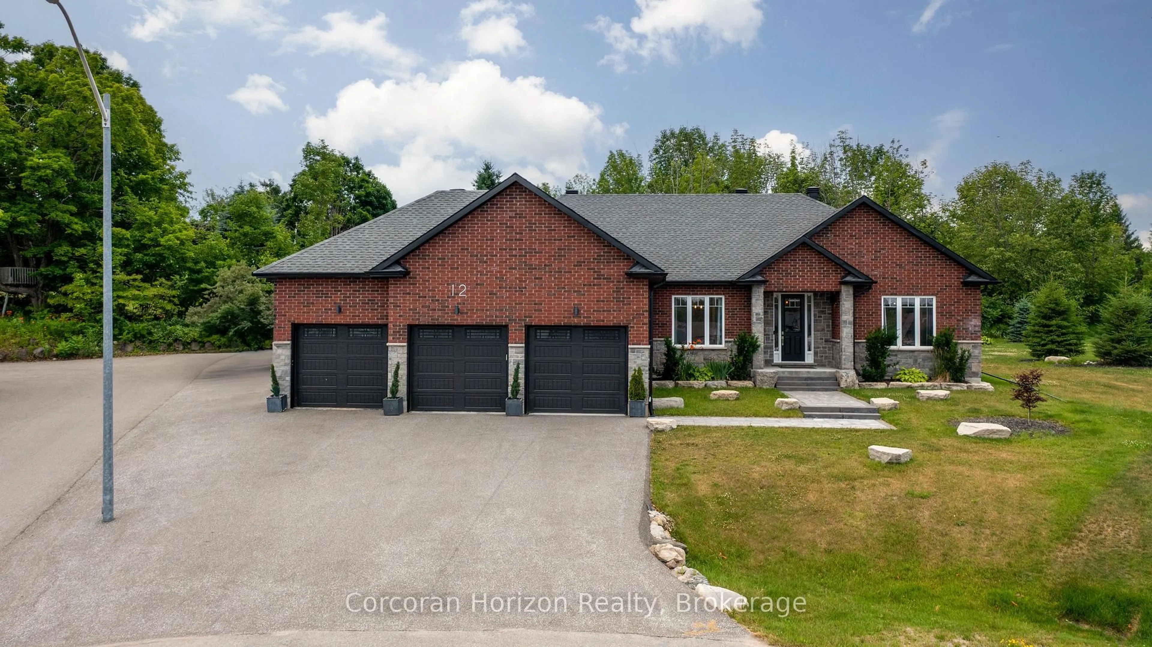 Home with brick exterior material, street for 12 REIDS Rdge, Oro-Medonte Ontario L0K 1N0