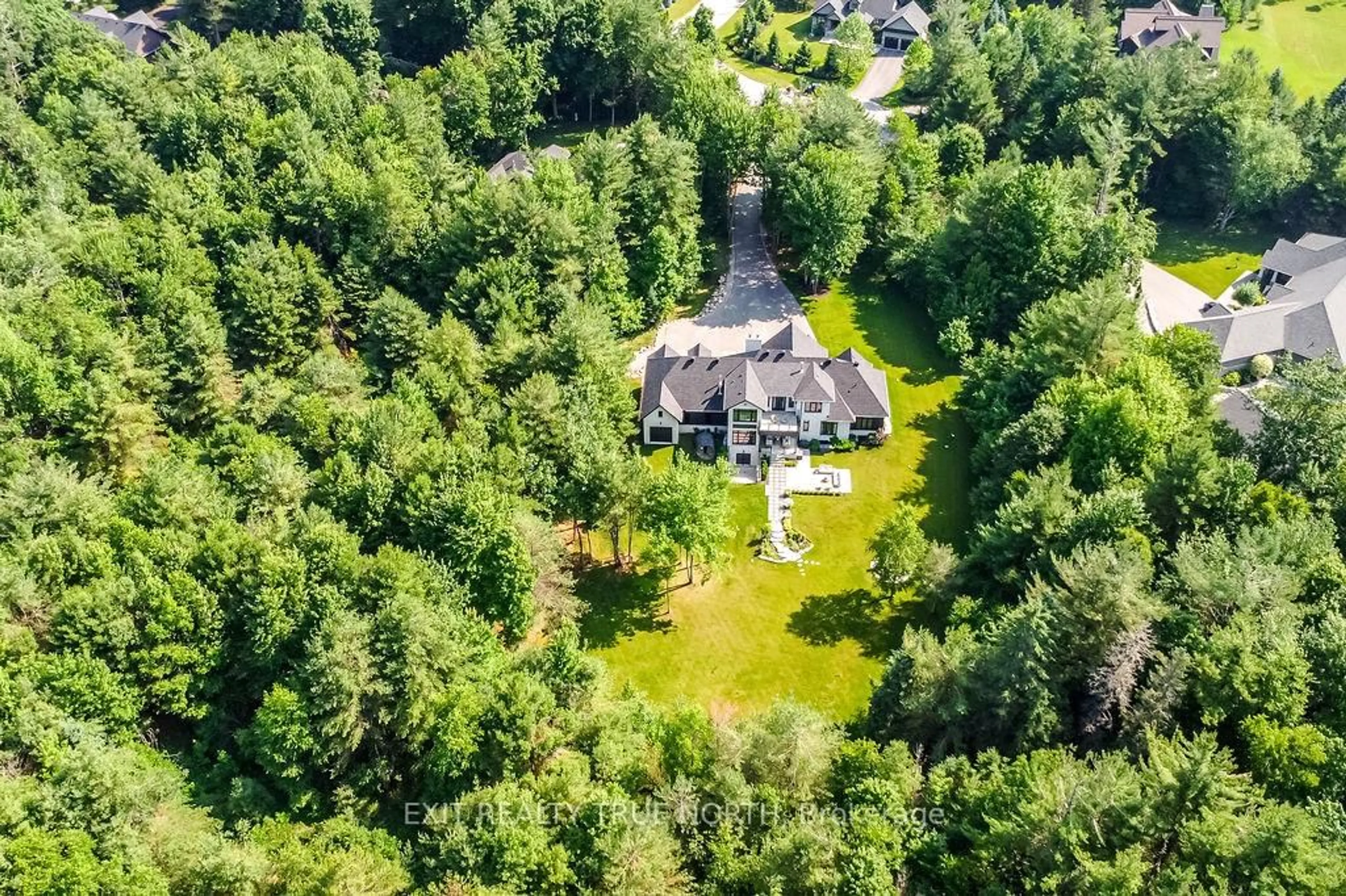 A pic from outside/outdoor area/front of a property/back of a property/a pic from drone, forest/trees view for 4 Sycamore Circ, Springwater Ontario L0L 2K0