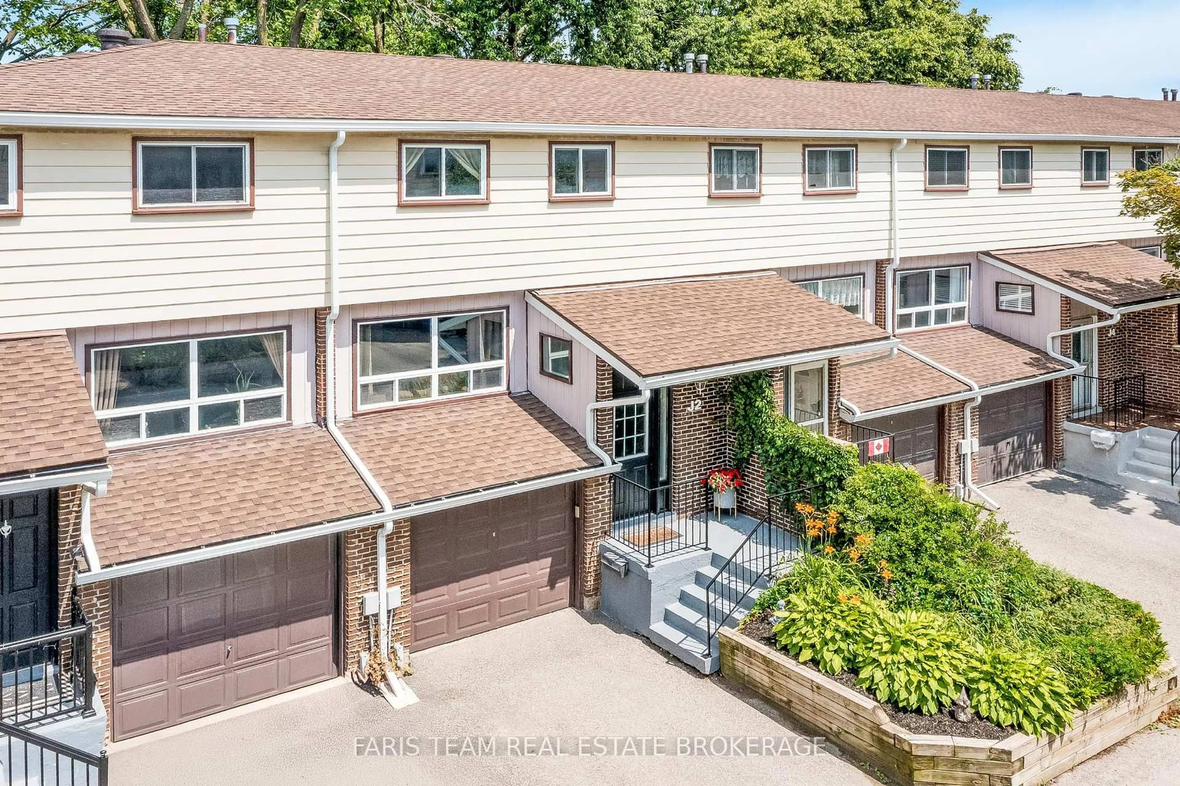 A pic from outside/outdoor area/front of a property/back of a property/a pic from drone, street for 63 Ferris Lane #J2, Barrie Ontario L4M 5C4