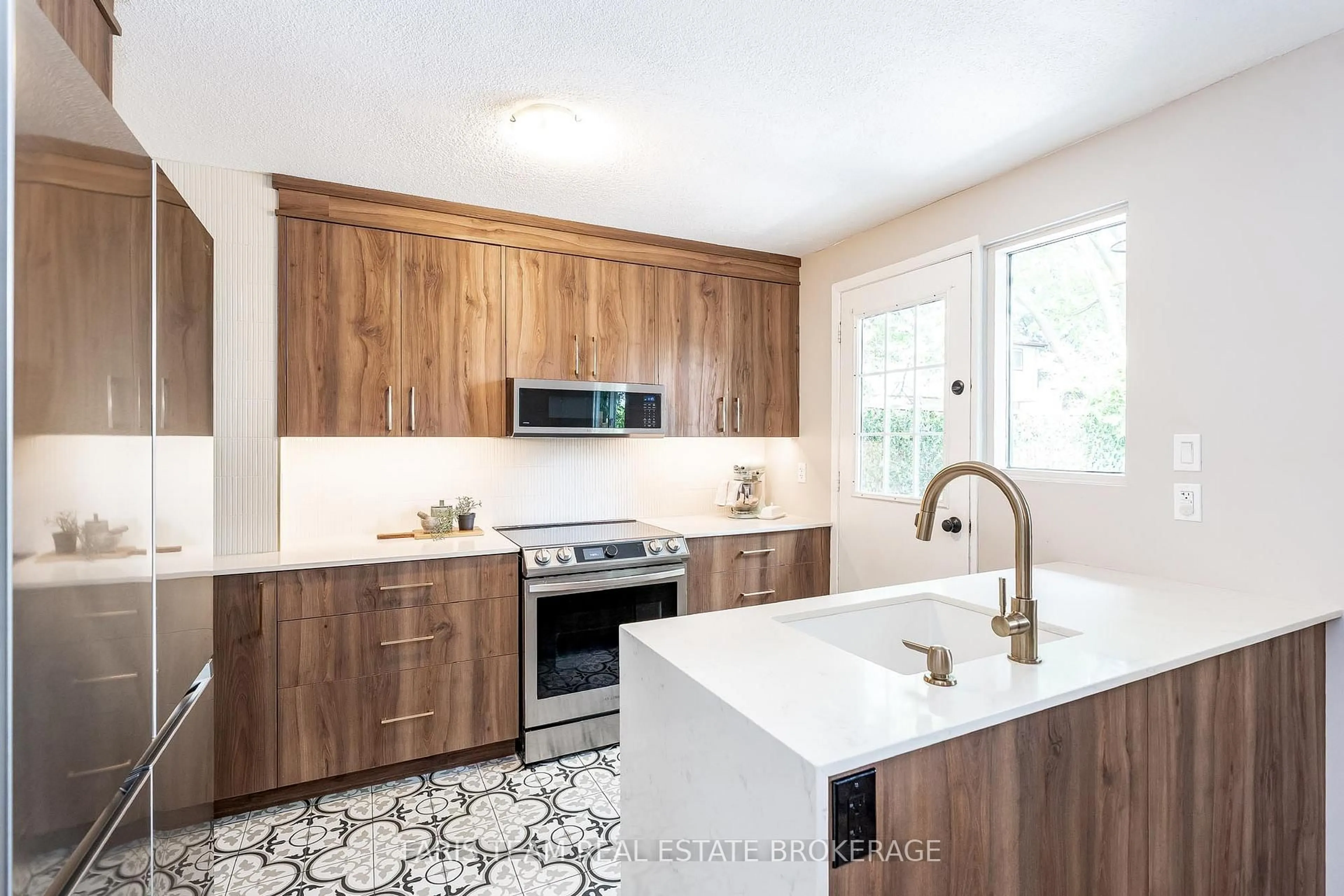 Contemporary kitchen, ceramic/tile floor for 63 Ferris Lane #J2, Barrie Ontario L4M 5C4