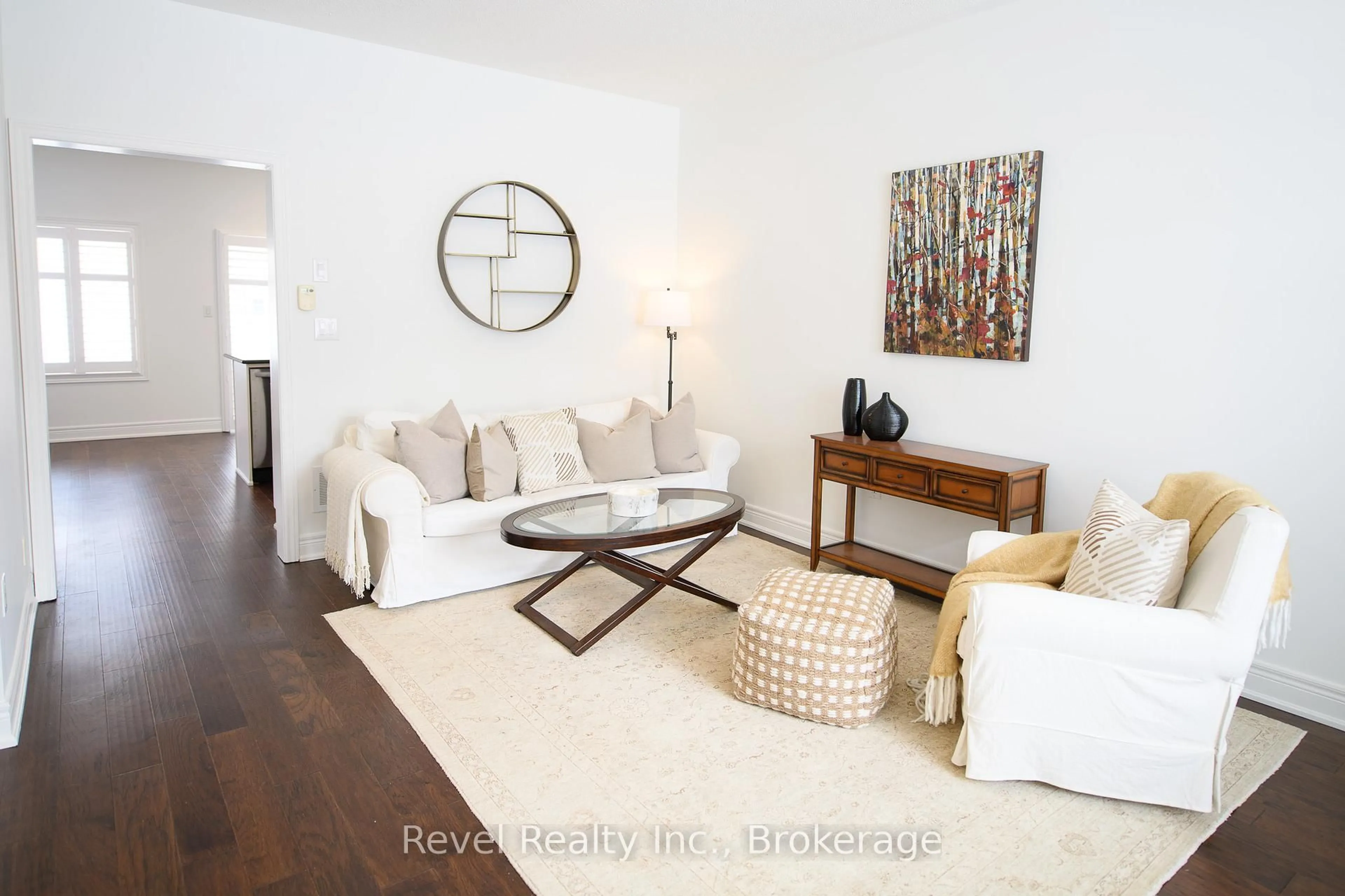 Living room with furniture, wood/laminate floor for 25 North Maple St, Collingwood Ontario L9Y 0J3