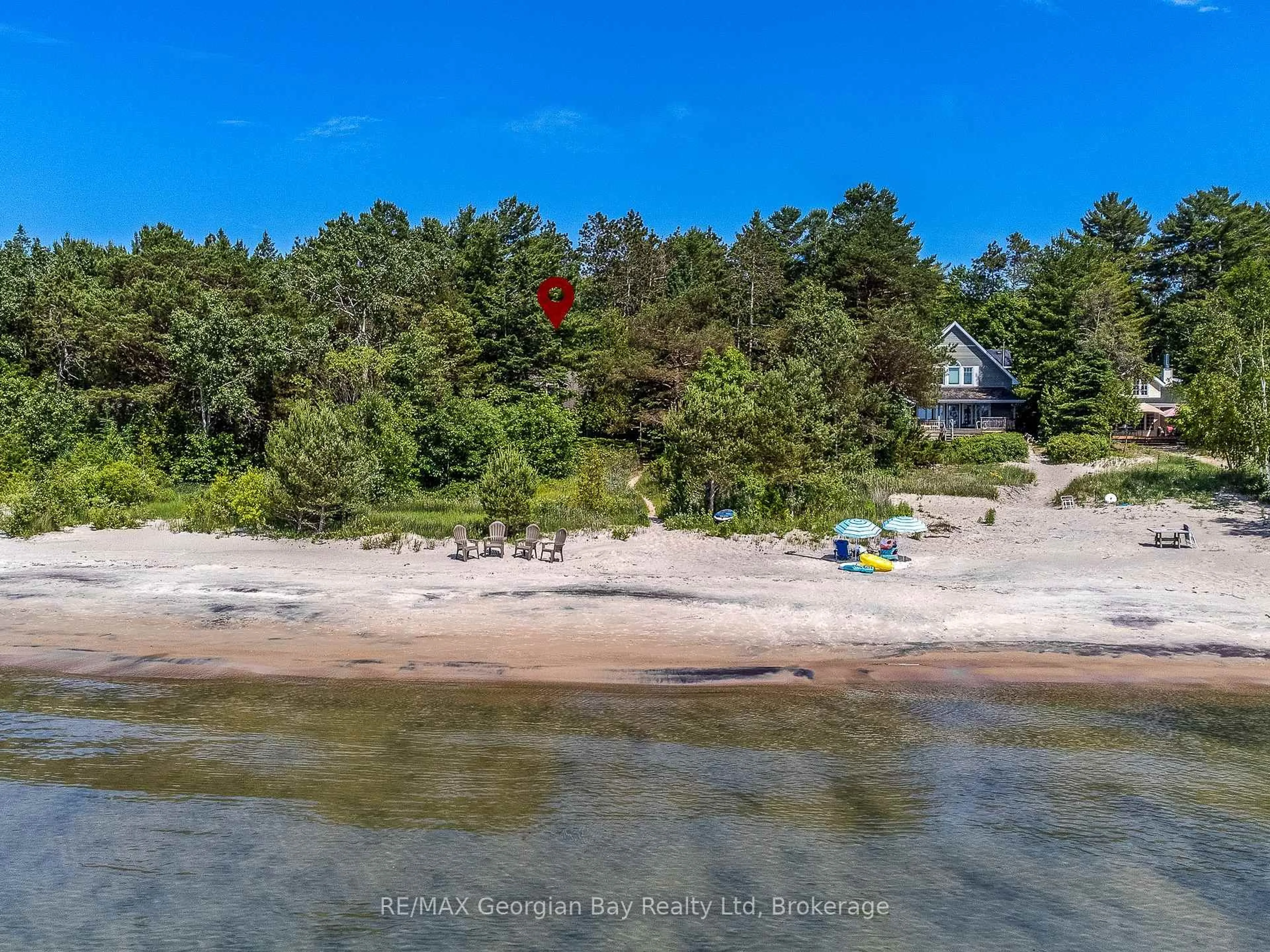 A pic from outside/outdoor area/front of a property/back of a property/a pic from drone, water/lake/river/ocean view for 698 Tiny Beaches Rd, Tiny Ontario L0L 2T0