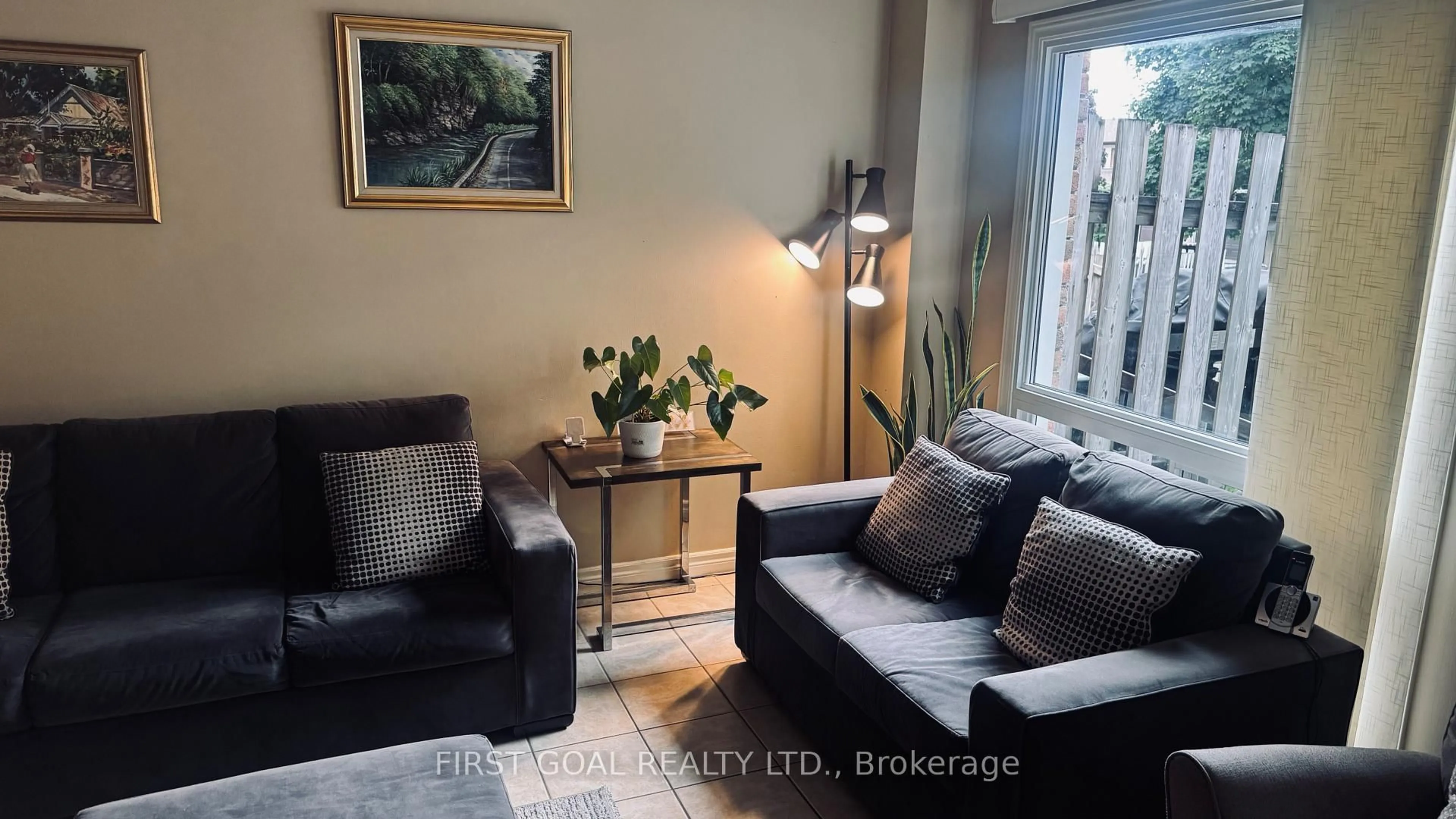 Living room with furniture, wood/laminate floor for 52 Adelaide St #37, Barrie Ontario L4N 3T5
