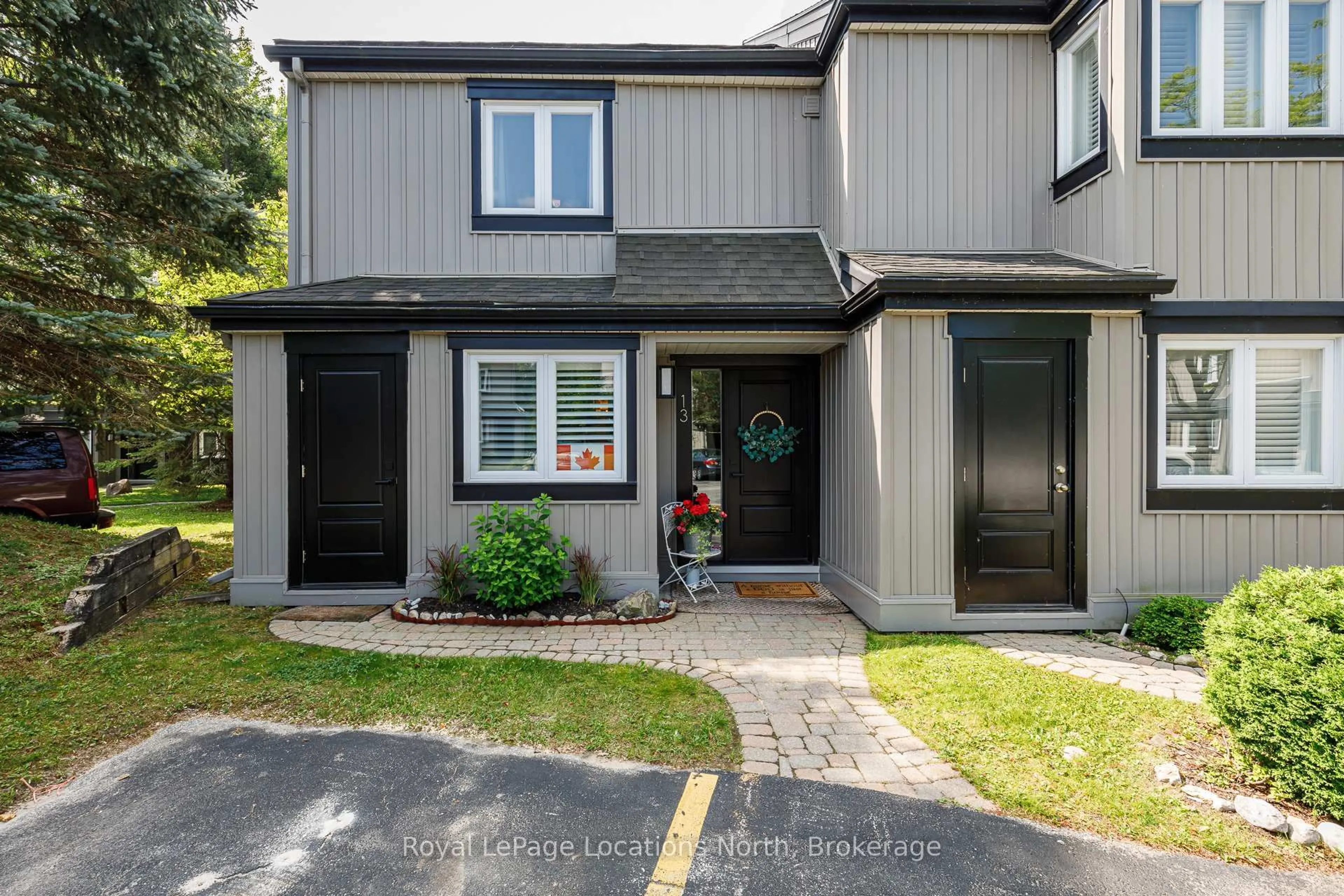 Home with vinyl exterior material, street for 5 Harbour St #13, Collingwood Ontario L9Y 5C5