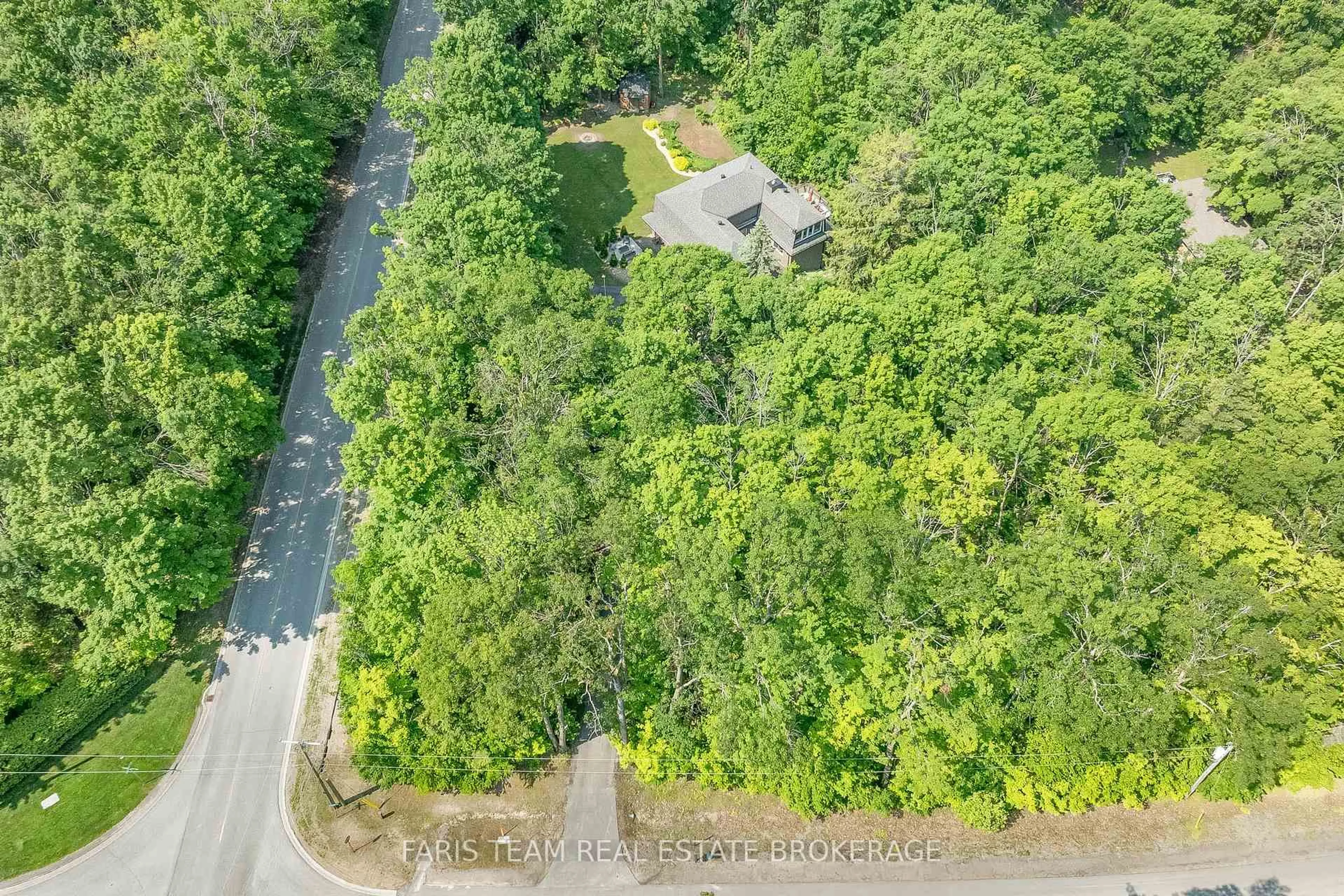 A pic from outside/outdoor area/front of a property/back of a property/a pic from drone, forest/trees view for 2 Woodland Cres, Oro-Medonte Ontario L4M 4Y8