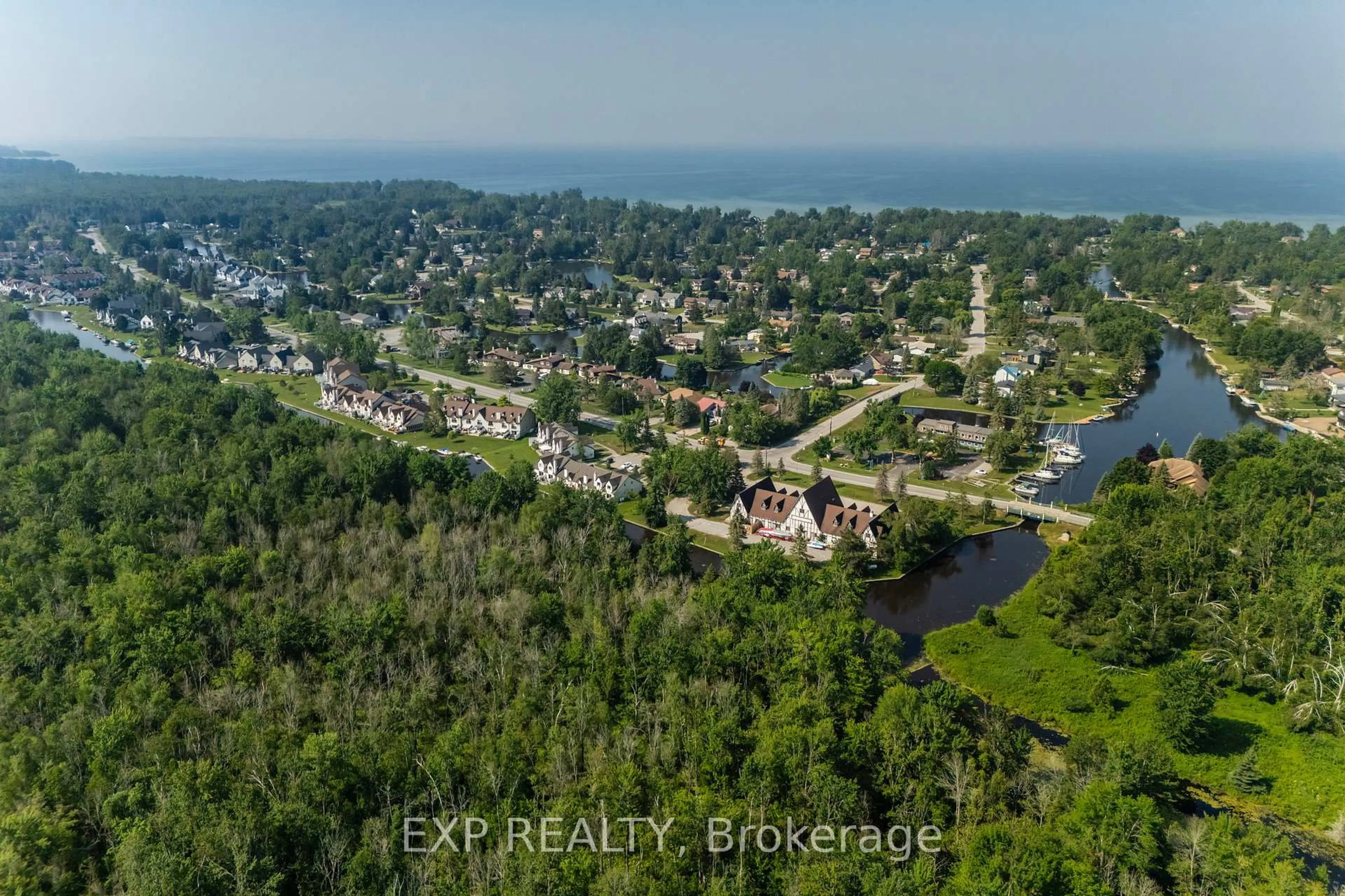 A pic from outside/outdoor area/front of a property/back of a property/a pic from drone, water/lake/river/ocean view for 81 Laguna Pkwy #14, Ramara Ontario L0K 1B0