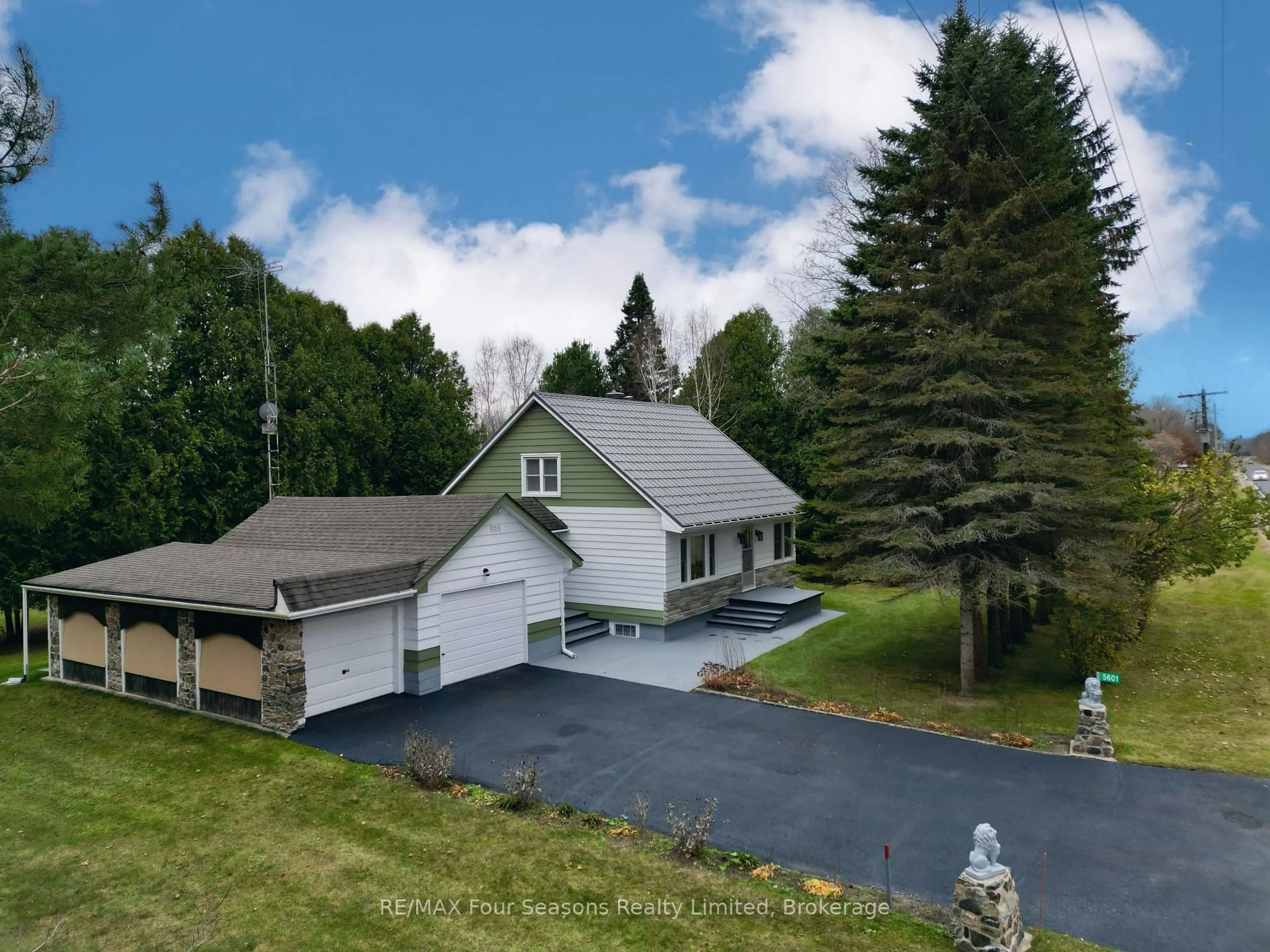 A pic from outside/outdoor area/front of a property/back of a property/a pic from drone, unknown for 5601 COUNTY ROAD 9, Clearview Ontario L0M 1N0