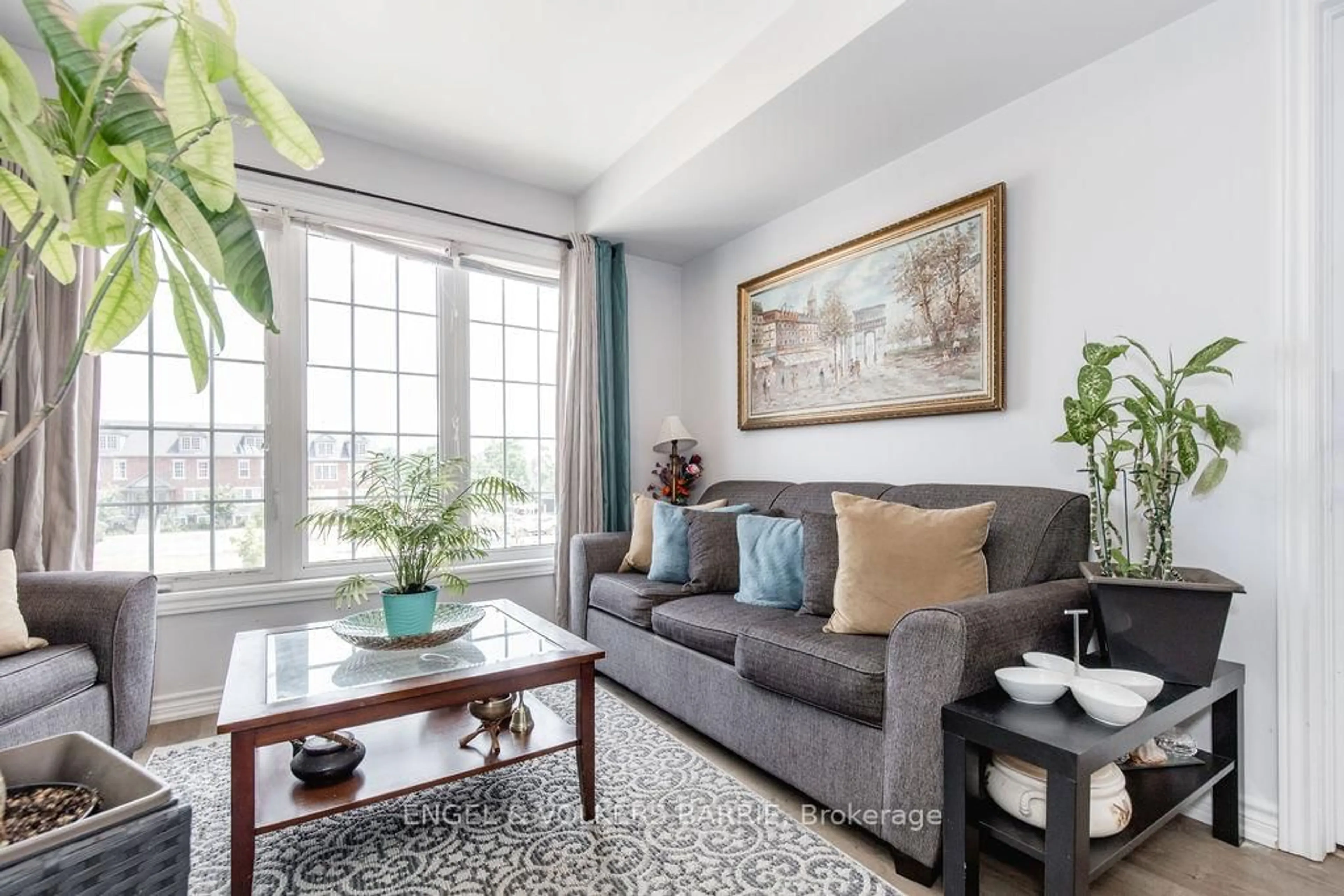 Living room with furniture, unknown for 246 Penetanguishene Rd #6, Barrie Ontario L4M 7C2