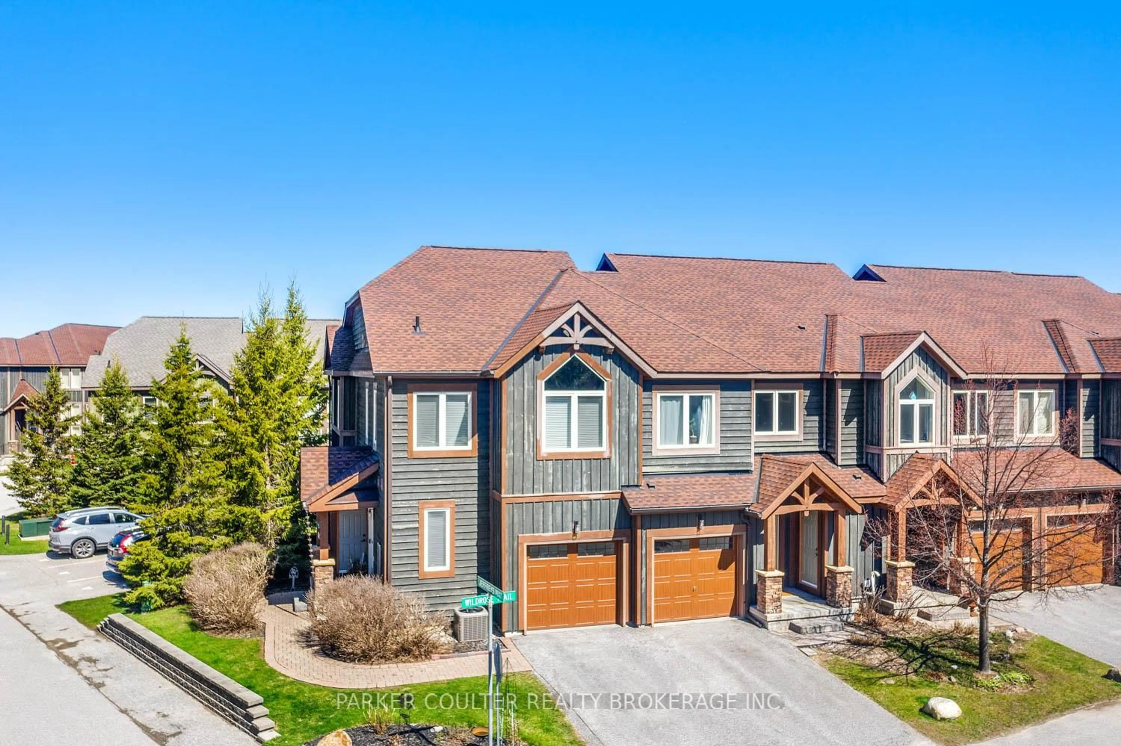 A pic from outside/outdoor area/front of a property/back of a property/a pic from drone, street for 20 Wildrose Tr #42, Collingwood Ontario L9Y 0J4