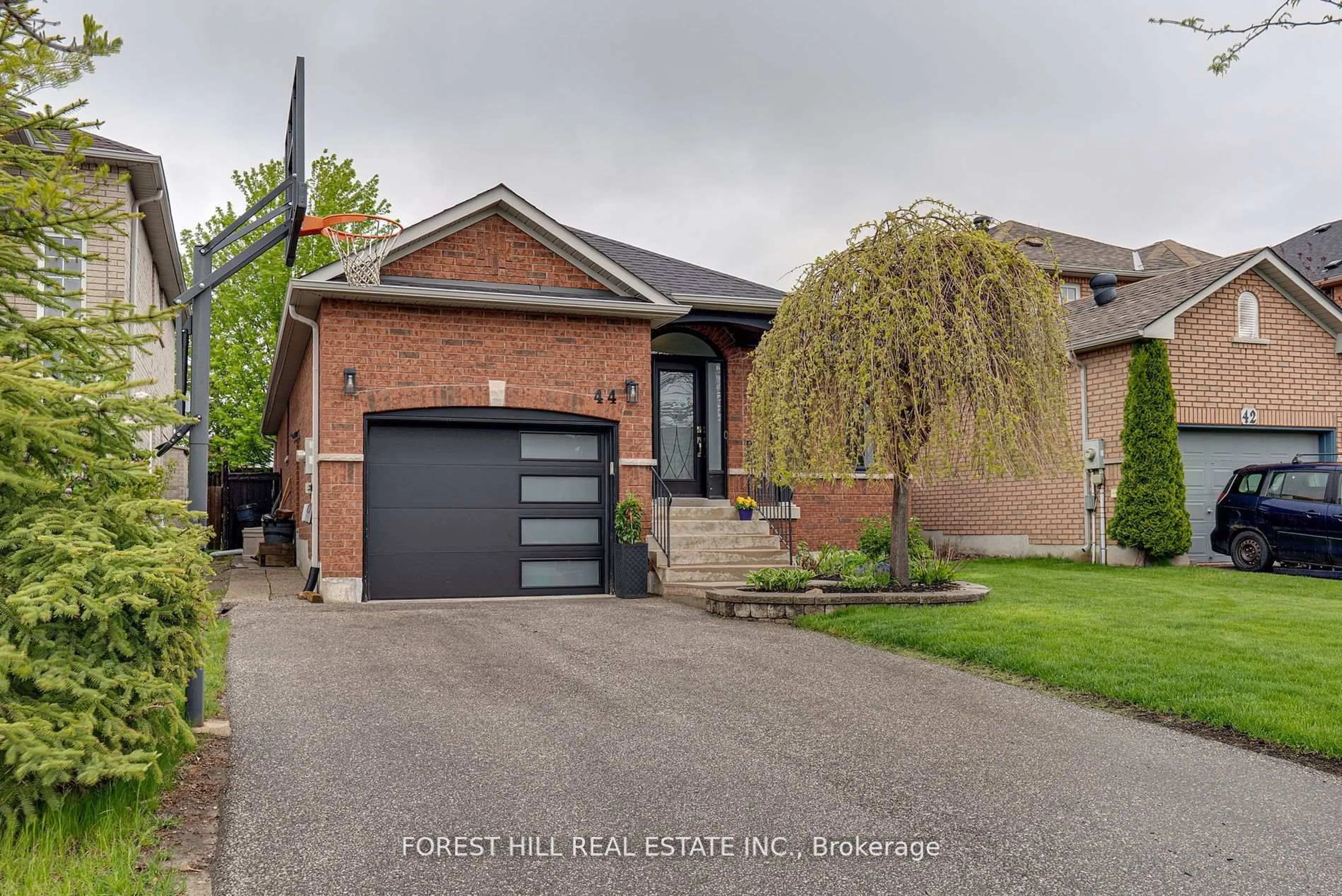 Home with brick exterior material, street for 44 Prince Of Wales Dr, Barrie Ontario L4N 0T1