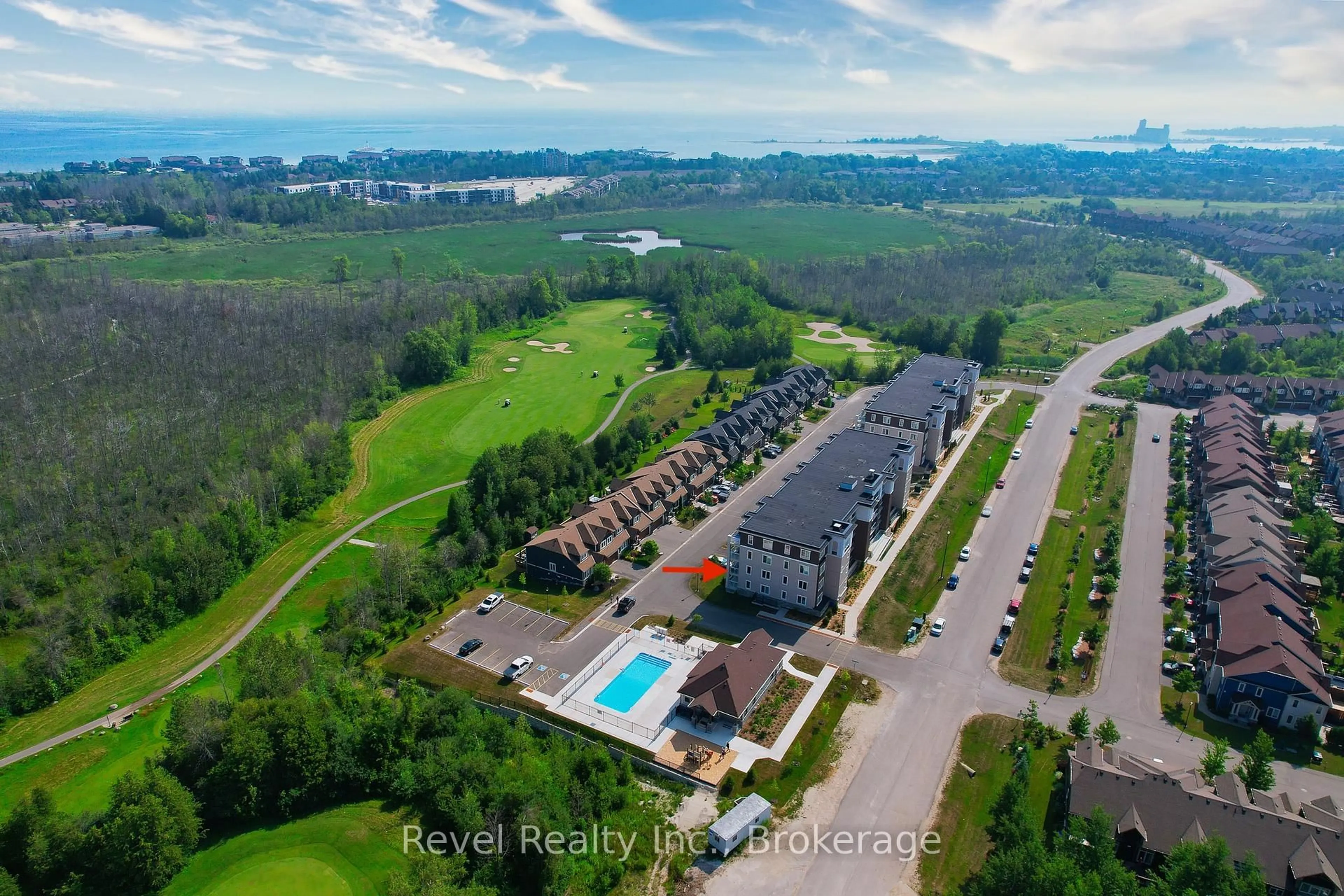 A pic from outside/outdoor area/front of a property/back of a property/a pic from drone, water/lake/river/ocean view for 17 Spooner Cres #201, Collingwood Ontario L9Y 1T3