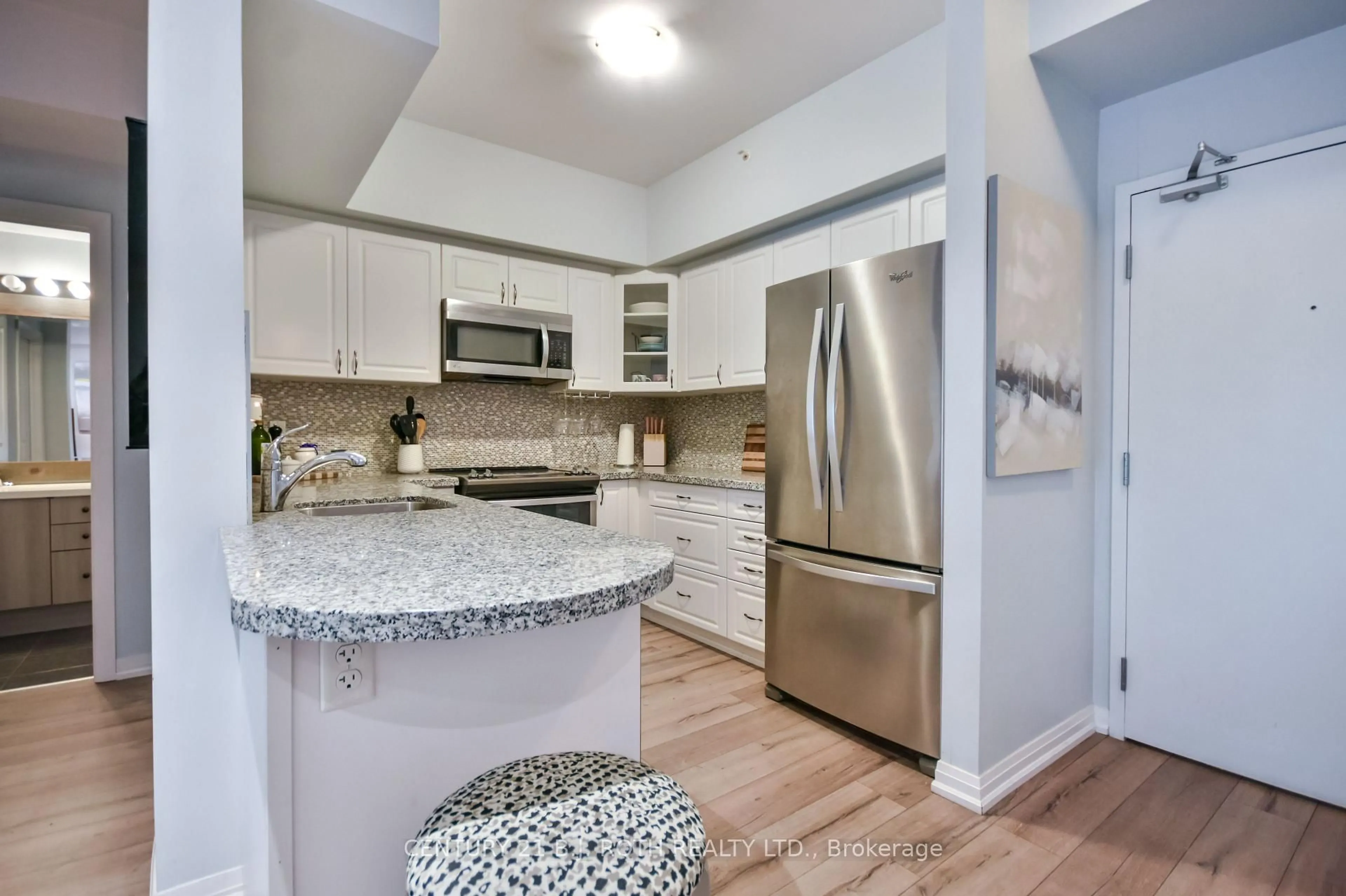 Open concept kitchen, ceramic/tile floor for 306 Essa Rd #107, Barrie Ontario L9J 0H5