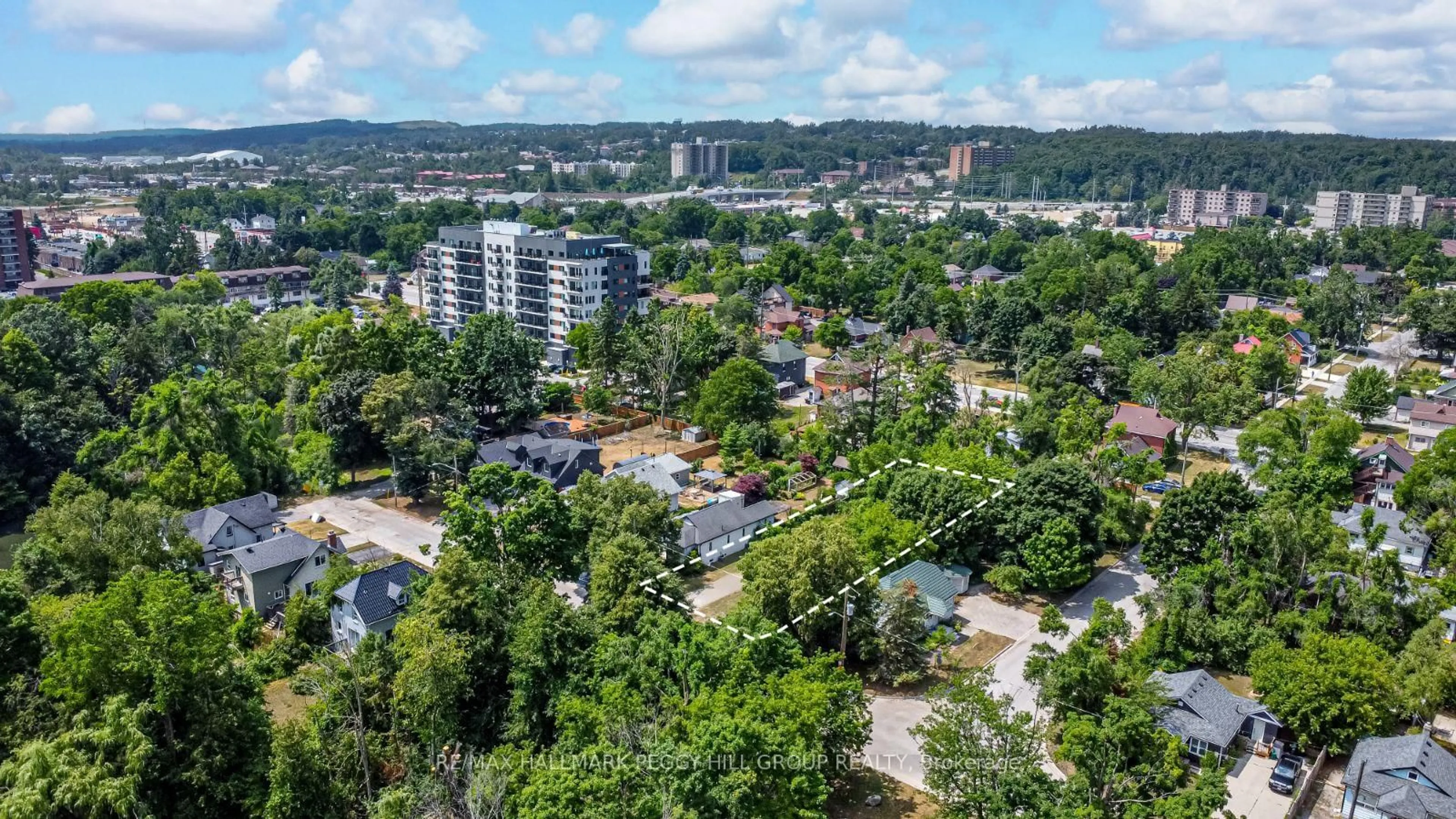 A pic from outside/outdoor area/front of a property/back of a property/a pic from drone, city buildings view from balcony for 40 Perry St, Barrie Ontario L4N 2G3