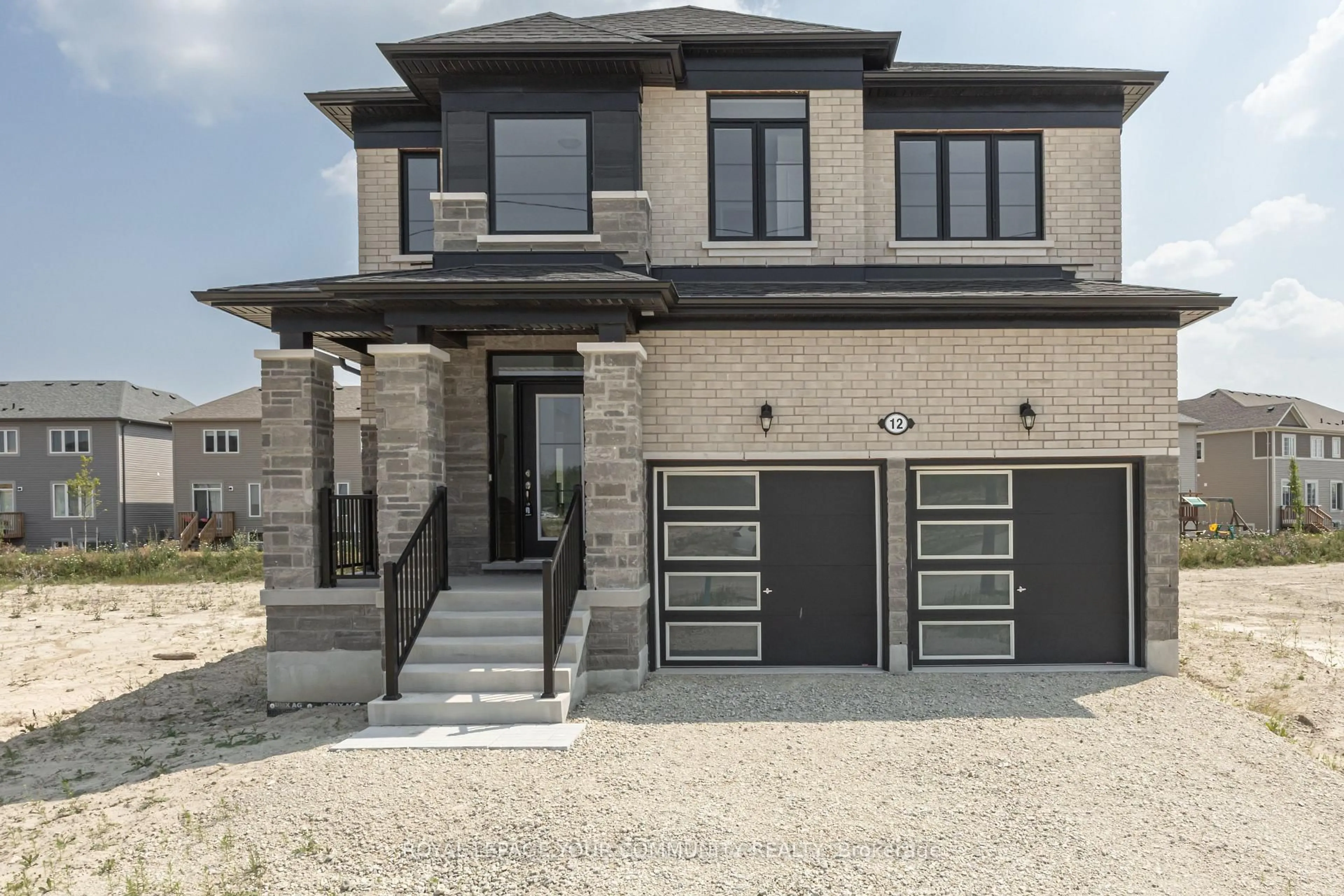 Home with brick exterior material, street for 12 Legacy Circ, Wasaga Beach Ontario L9Z 0M5