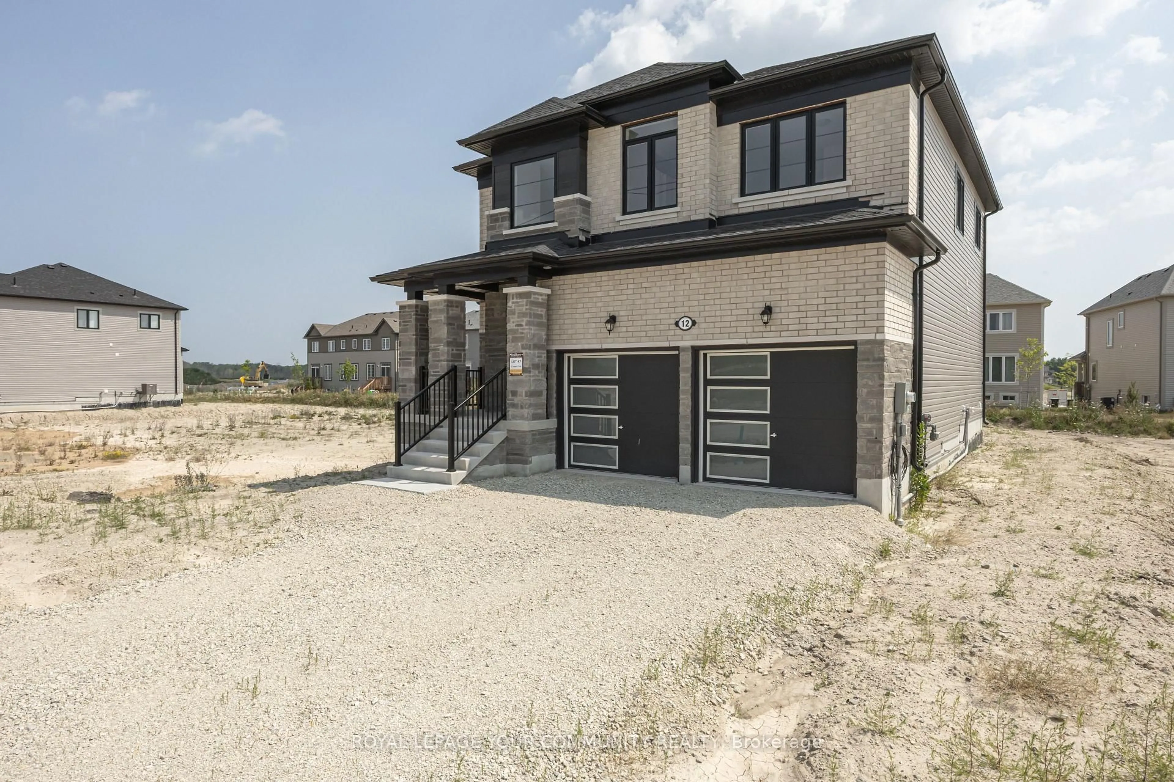 Home with brick exterior material, street for 12 Legacy Circ, Wasaga Beach Ontario L9Z 0M5