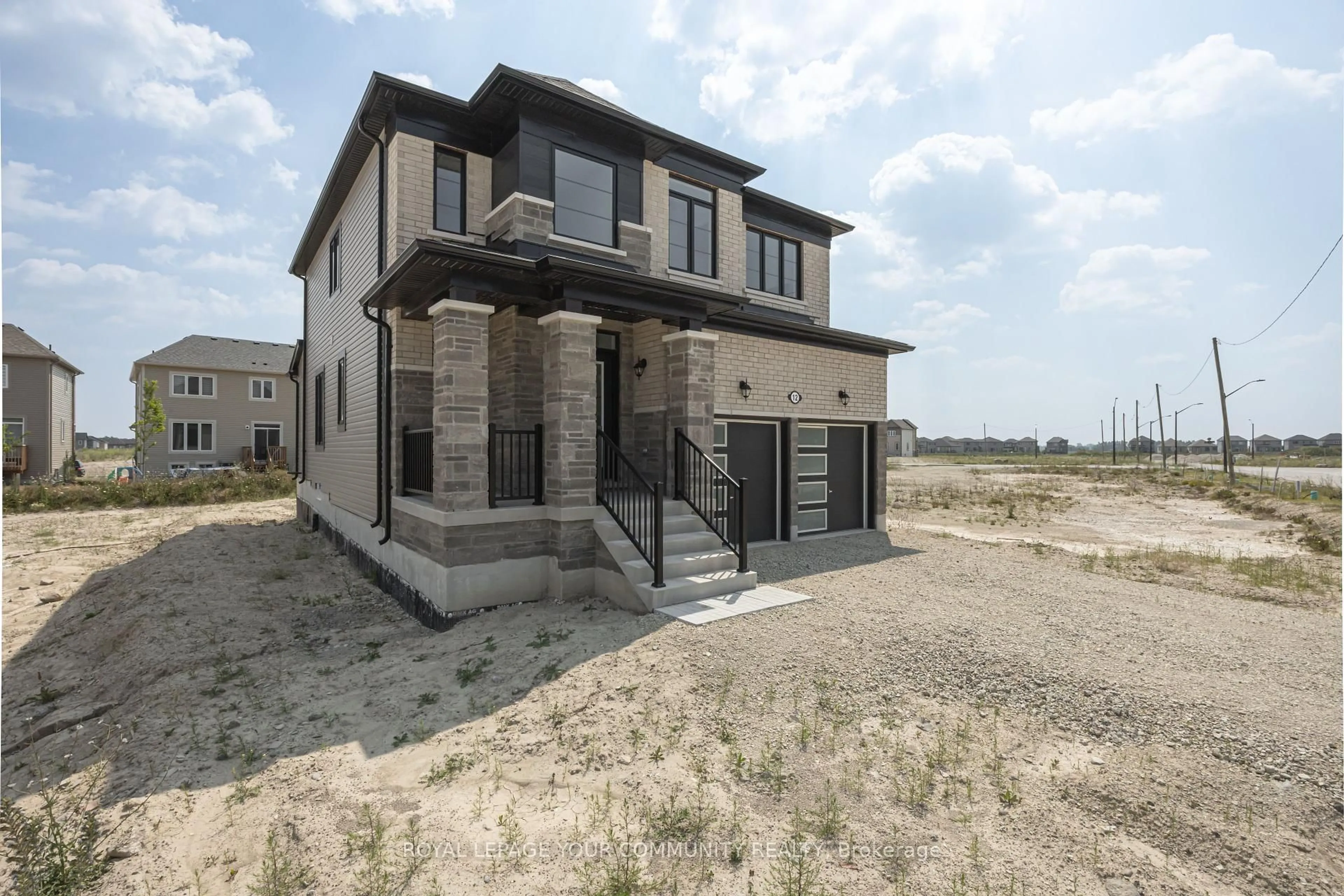 Home with brick exterior material, building for 12 Legacy Circ, Wasaga Beach Ontario L9Z 0M5