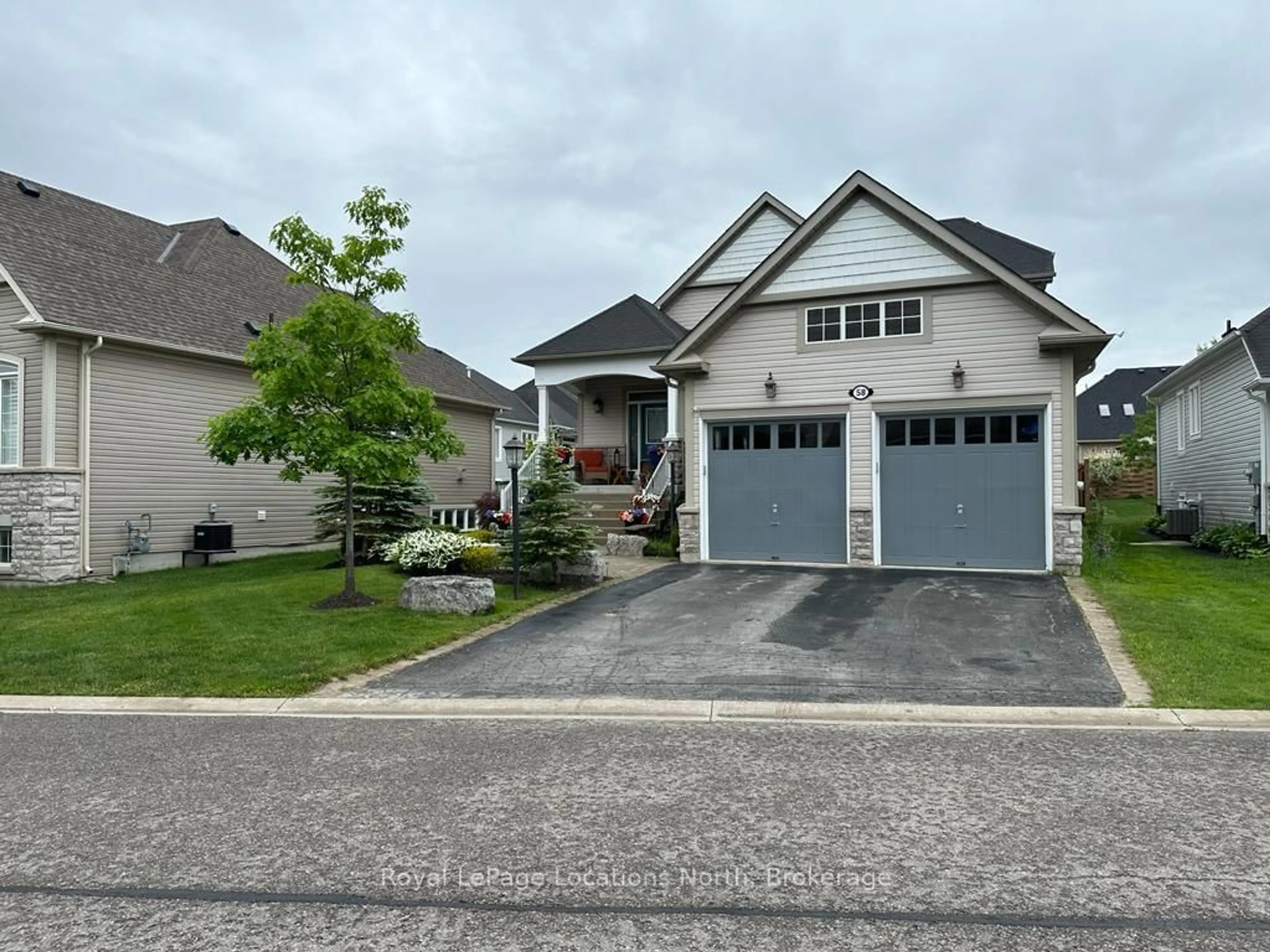 Home with vinyl exterior material, street for 58 Waterview Rd, Wasaga Beach Ontario L9Z 0E9