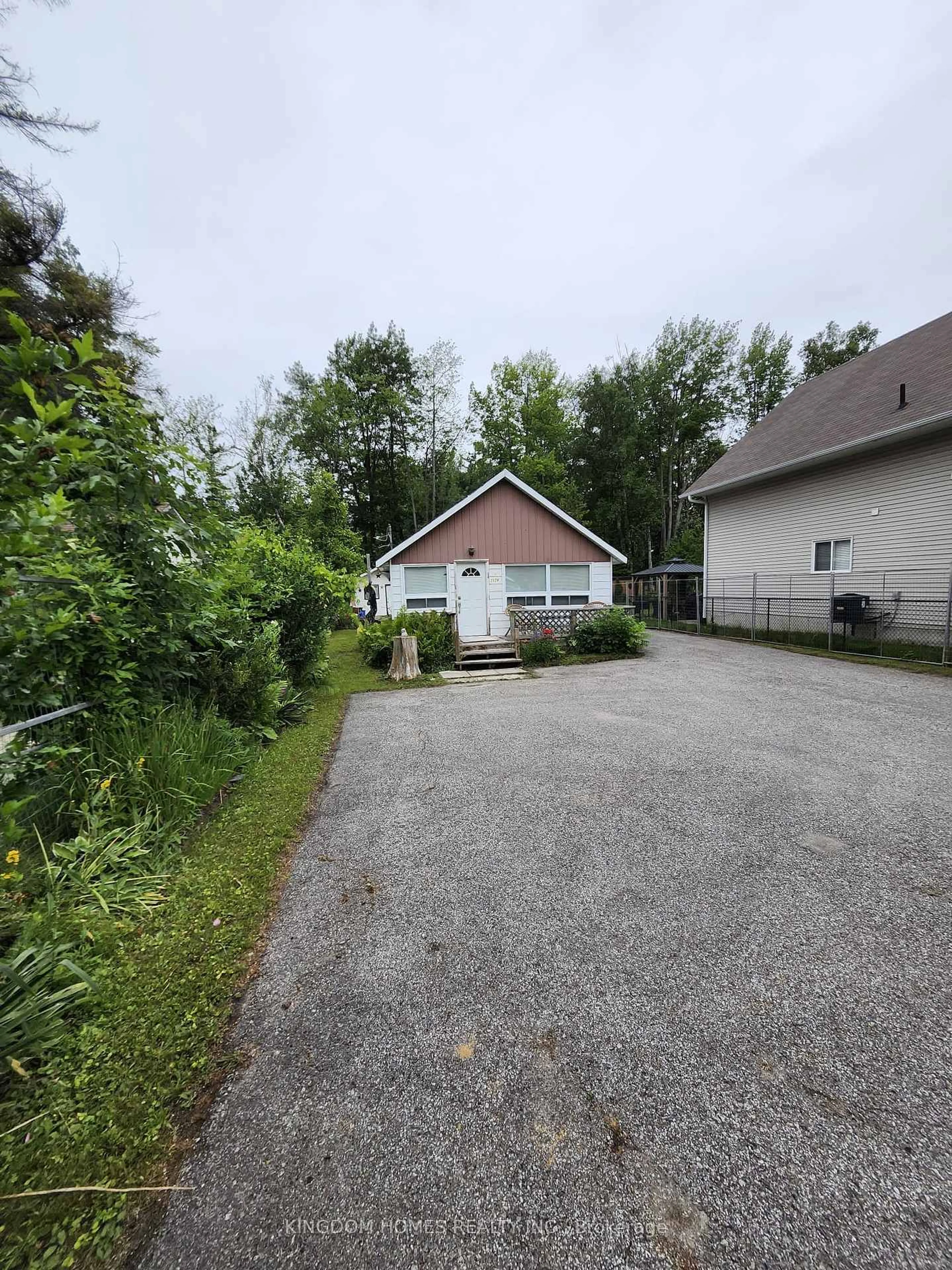A pic from outside/outdoor area/front of a property/back of a property/a pic from drone, street for 3124 Mosley St, Wasaga Beach Ontario L9Z 1V6
