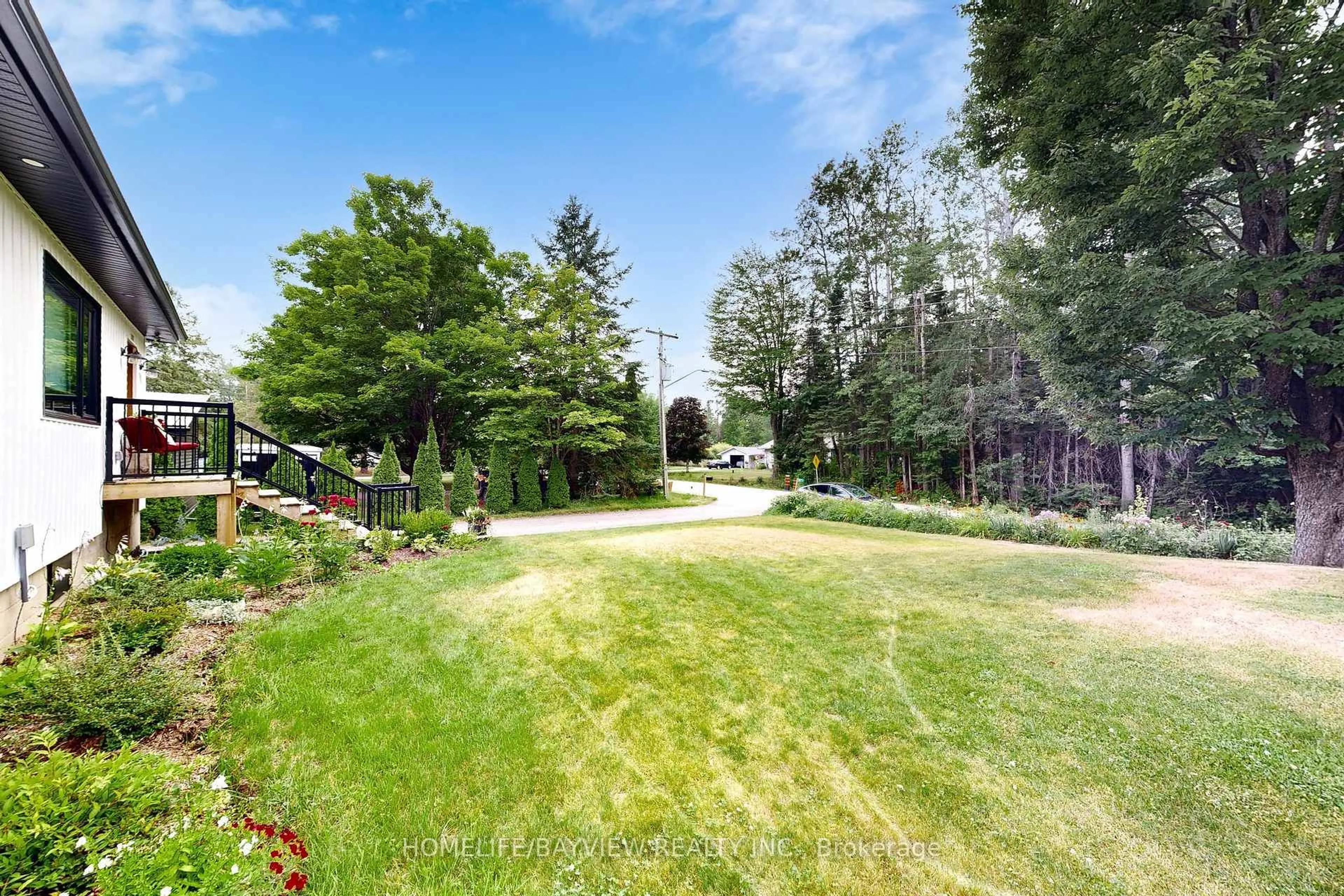 Patio, forest/trees view for 1371 Gill Rd, Springwater Ontario L9X 1M3