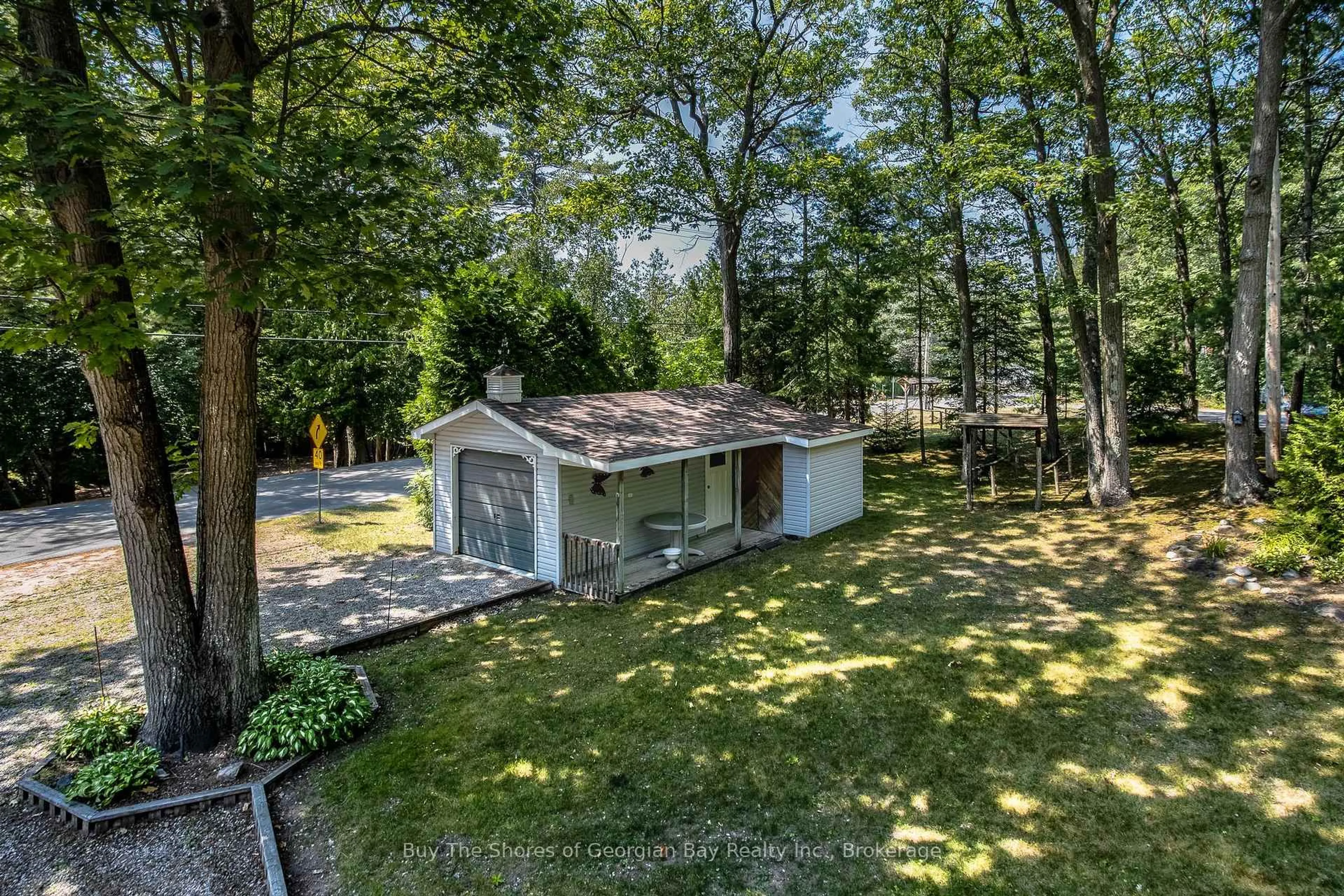A pic from outside/outdoor area/front of a property/back of a property/a pic from drone, unknown for 2249 Tiny Beaches Rd, Tiny Ontario L0L 1P1