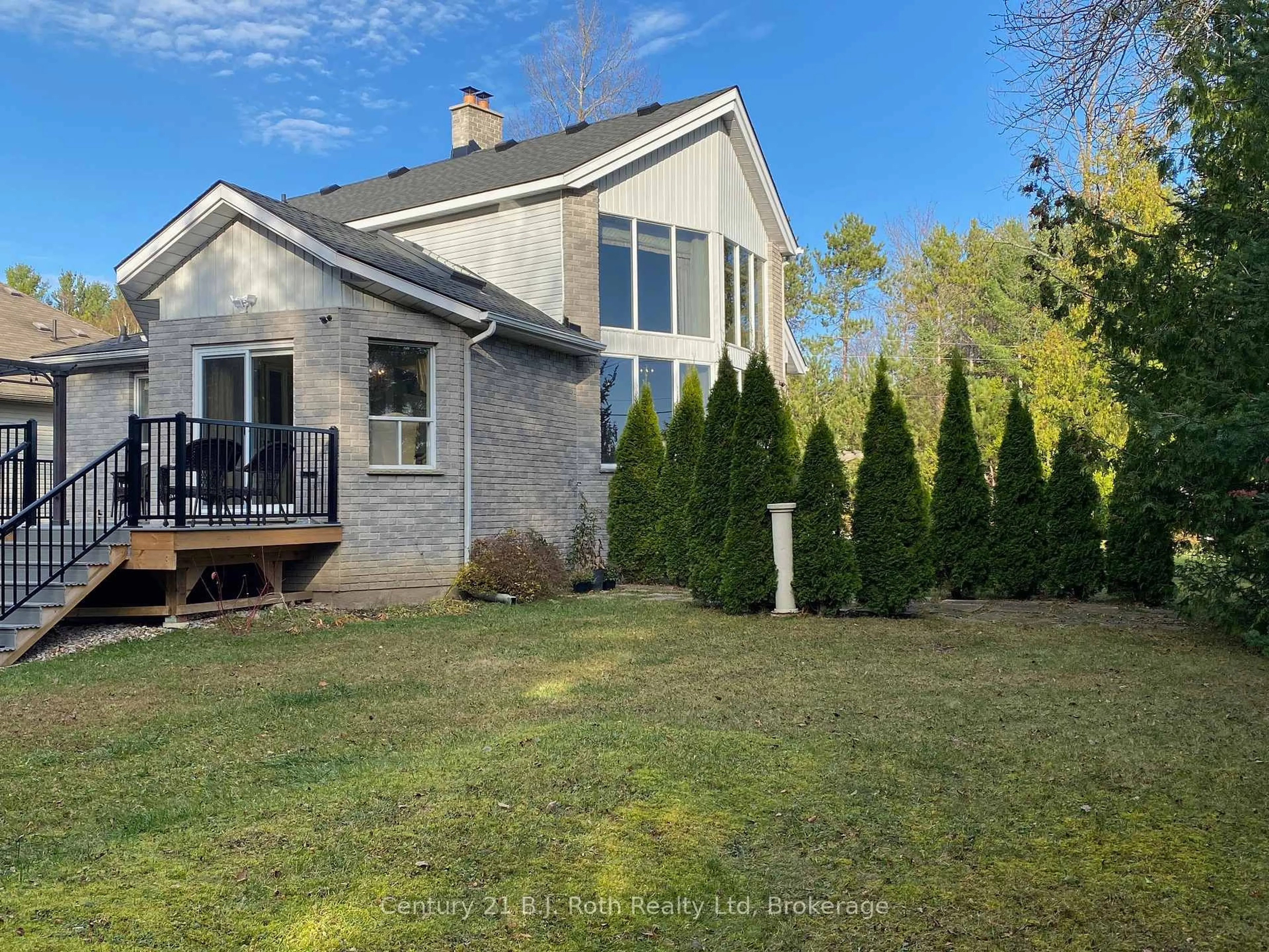 A pic from outside/outdoor area/front of a property/back of a property/a pic from drone, water/lake/river/ocean view for 20 Grant Ave, Tiny Ontario L0L 1P1