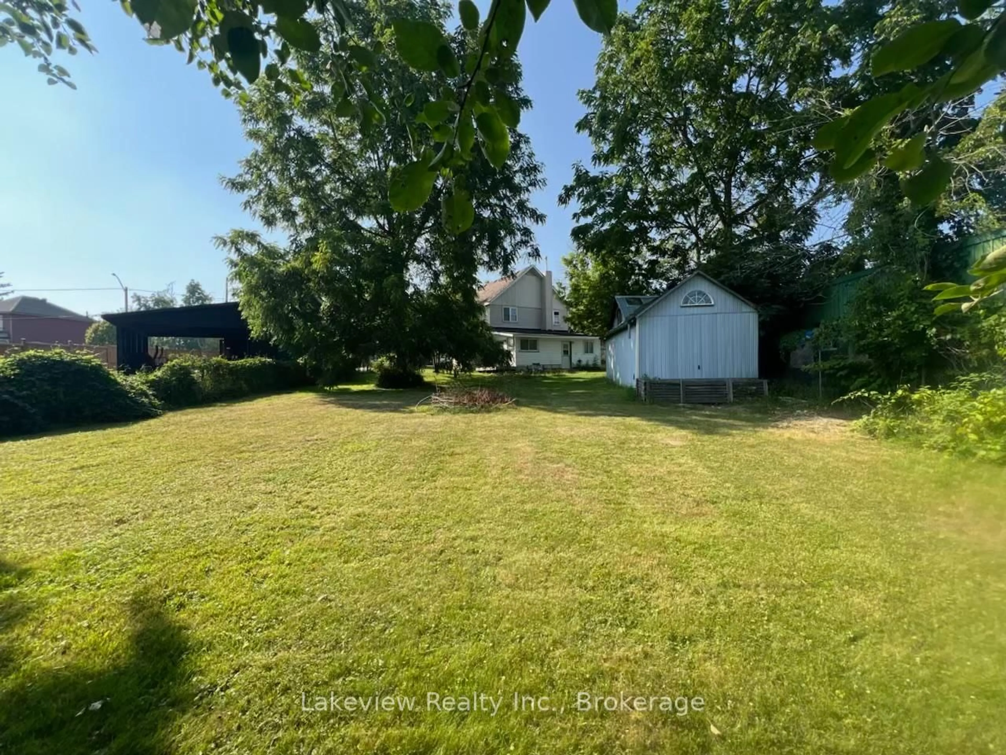 A pic from outside/outdoor area/front of a property/back of a property/a pic from drone, water/lake/river/ocean view for 159 Barrie Rd, Orillia Ontario L3V 2P6