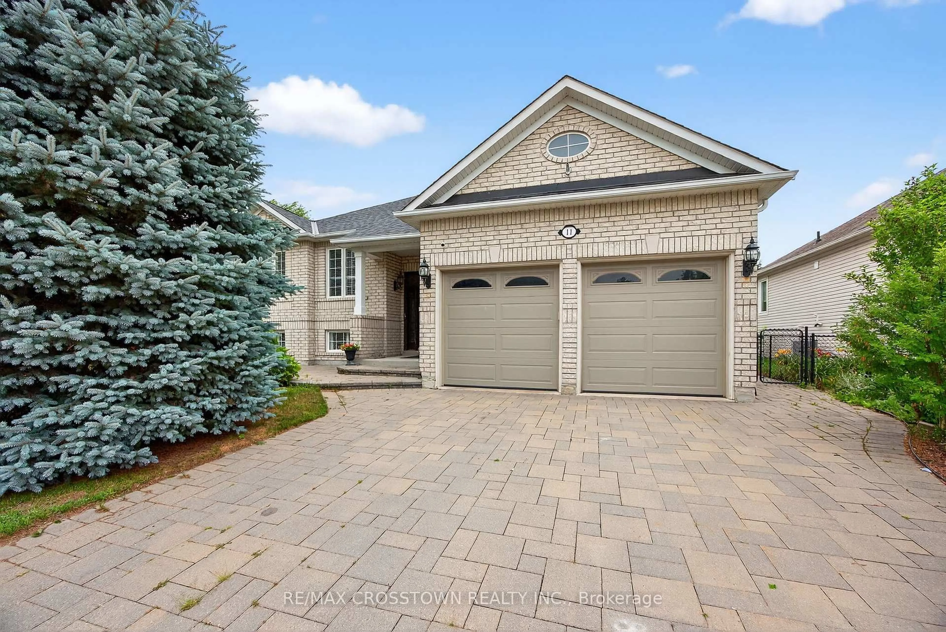 Home with brick exterior material, street for 11 NORTHWOOD Dr, Wasaga Beach Ontario L9Z 3B5