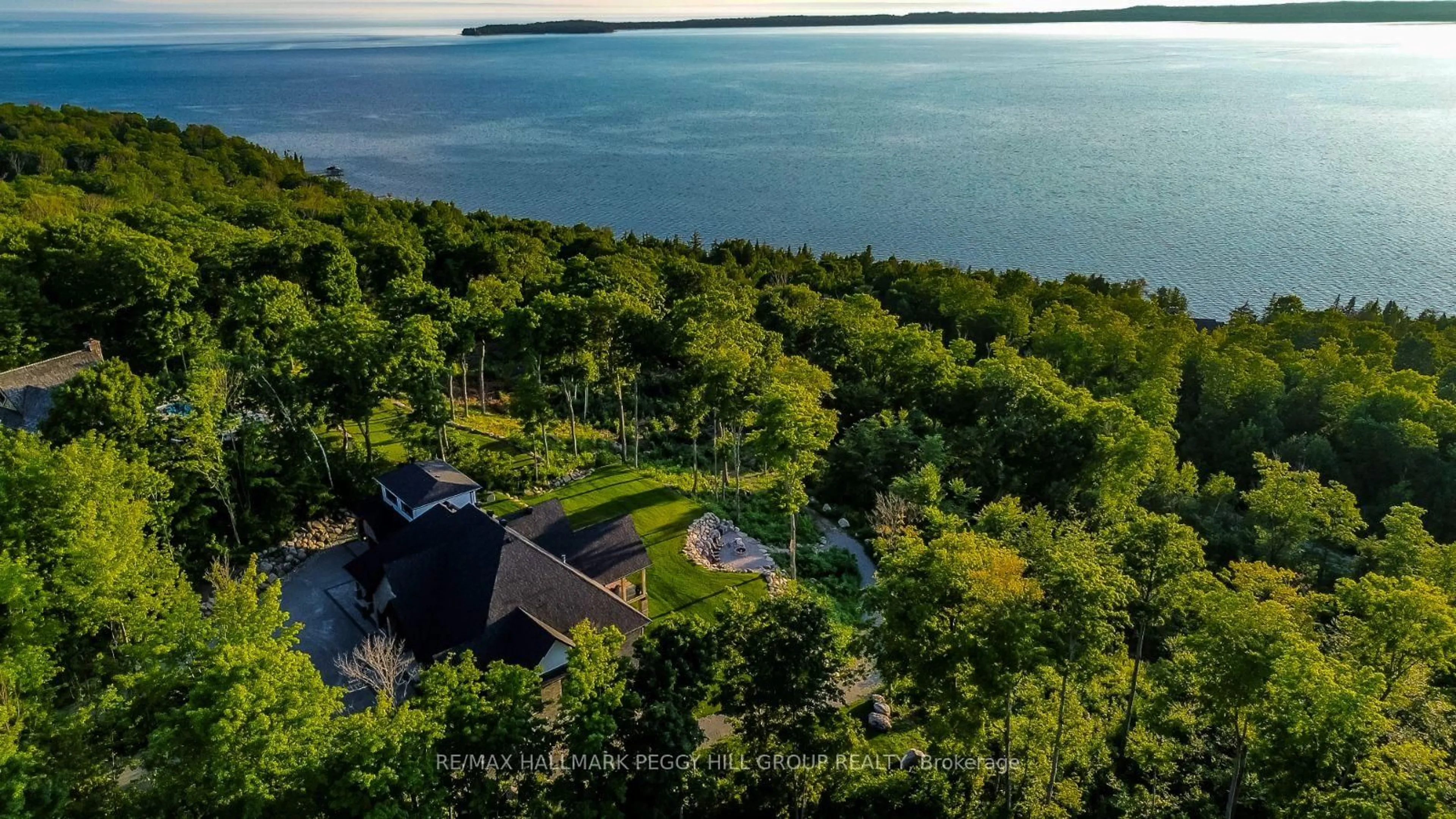 A pic from outside/outdoor area/front of a property/back of a property/a pic from drone, water/lake/river/ocean view for 49 Melissa Lane, Tiny Ontario L9M 0T8