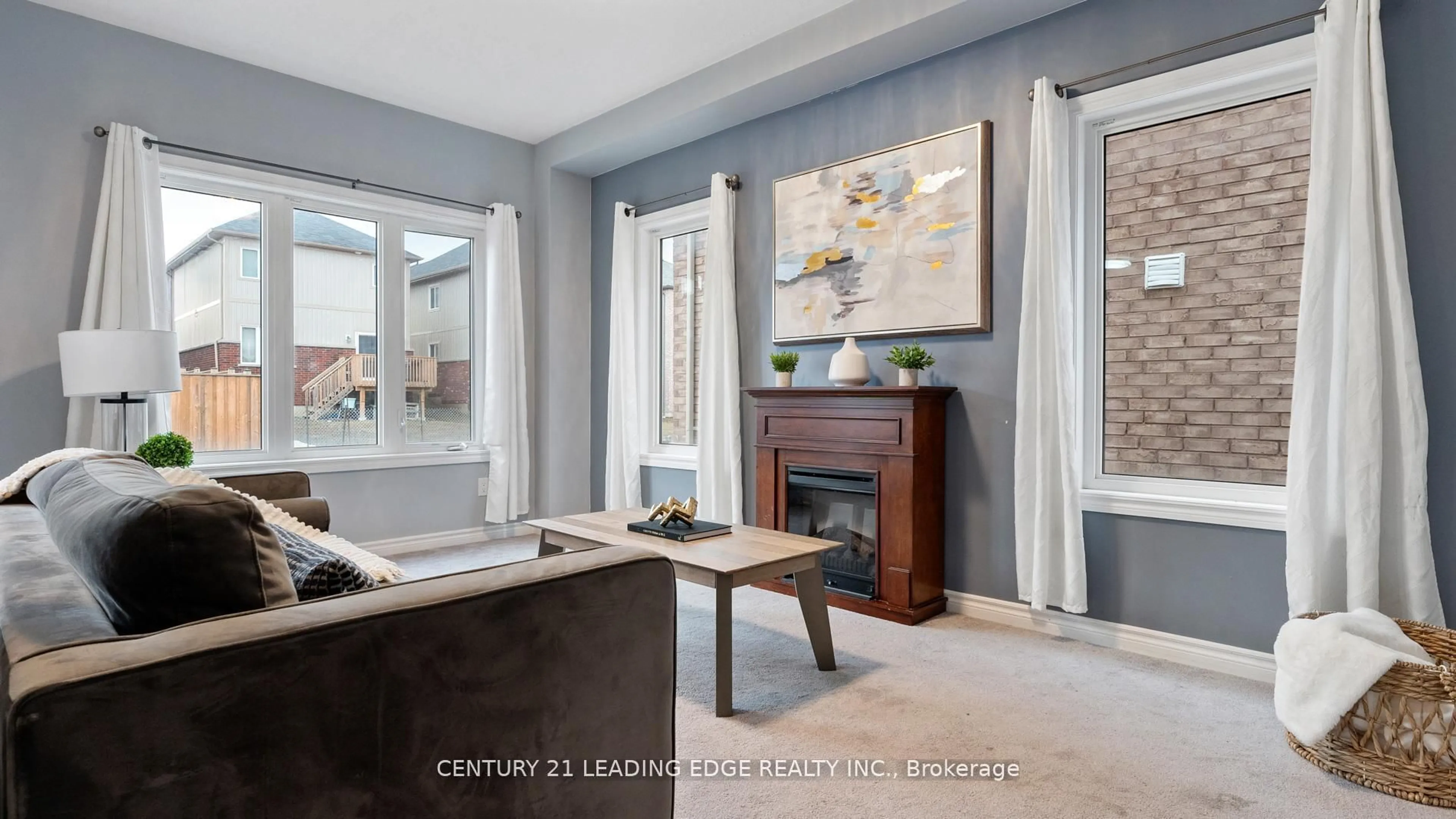 Living room with furniture, ceramic/tile floor for 106 Diana Dr, Orillia Ontario L3V 8J7