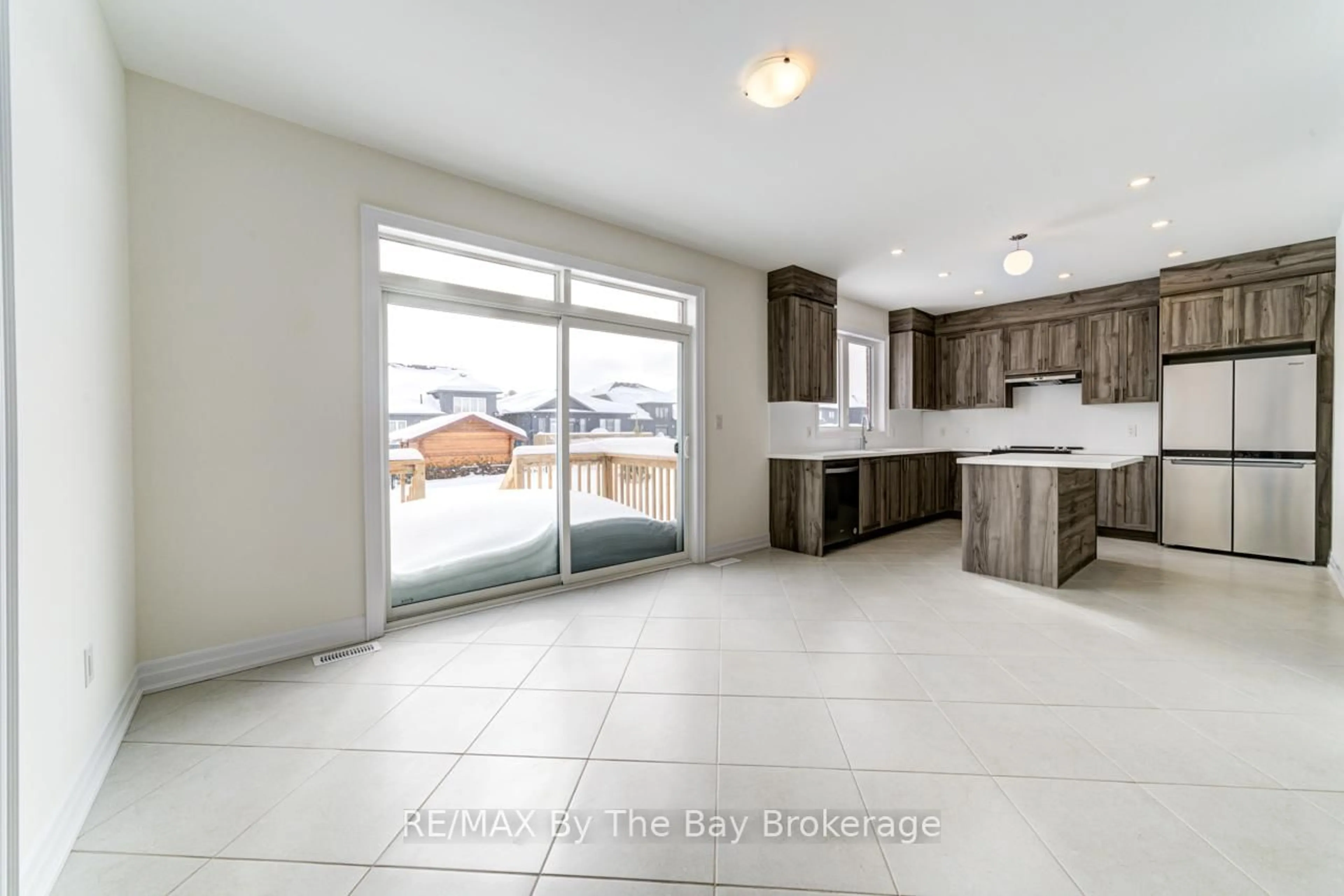 Open concept kitchen, ceramic/tile floor for 202 Mapleside Dr, Wasaga Beach Ontario L9Z 0L4