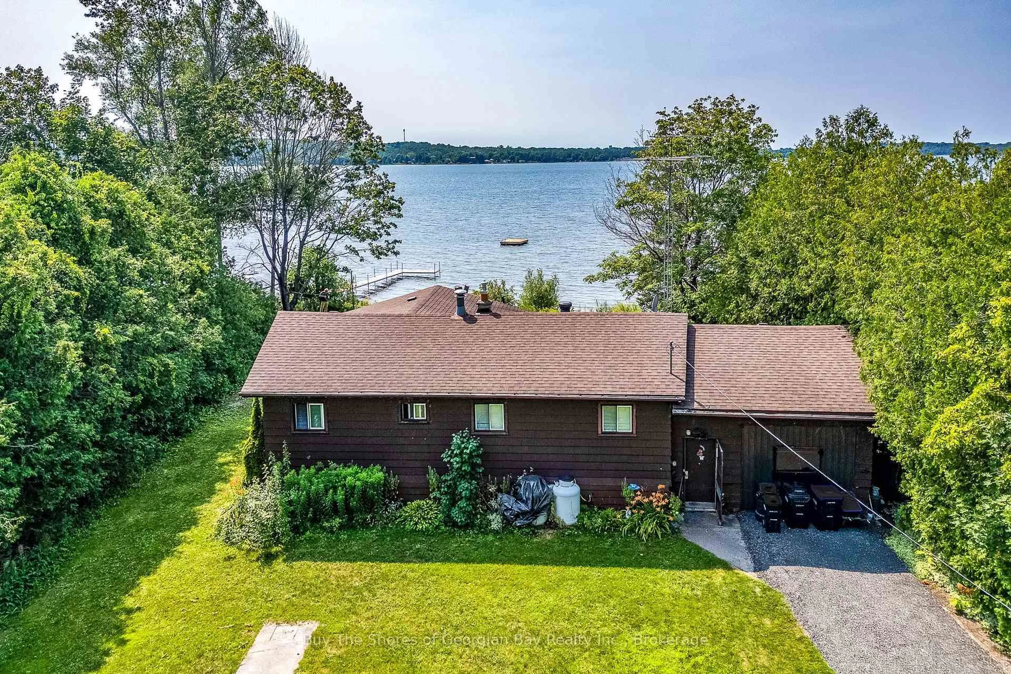 A pic from outside/outdoor area/front of a property/back of a property/a pic from drone, water/lake/river/ocean view for 12 Acorn Lane, Tay Ontario L0K 2C0
