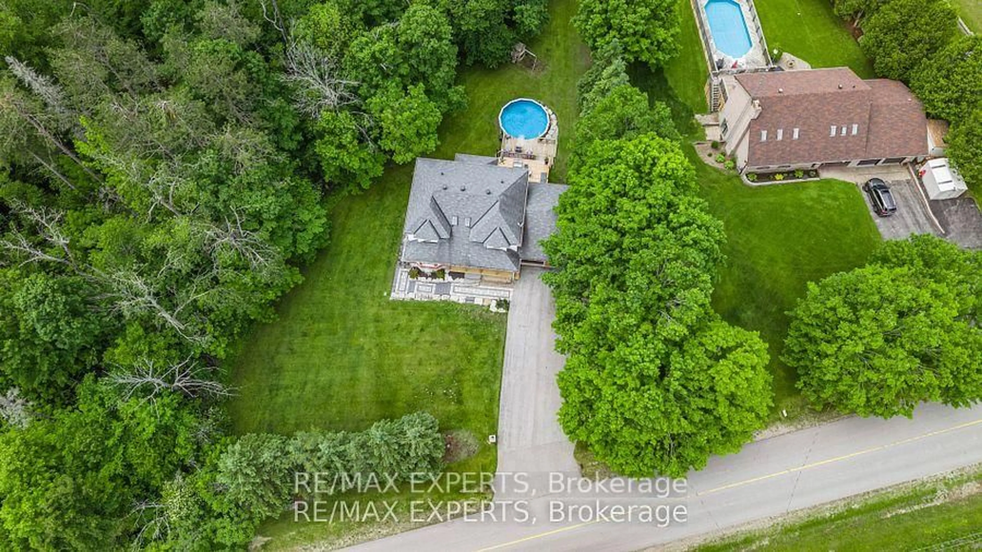 A pic from outside/outdoor area/front of a property/back of a property/a pic from drone, water/lake/river/ocean view for 602 Scarlett Line, Springwater Ontario L4R 4K3