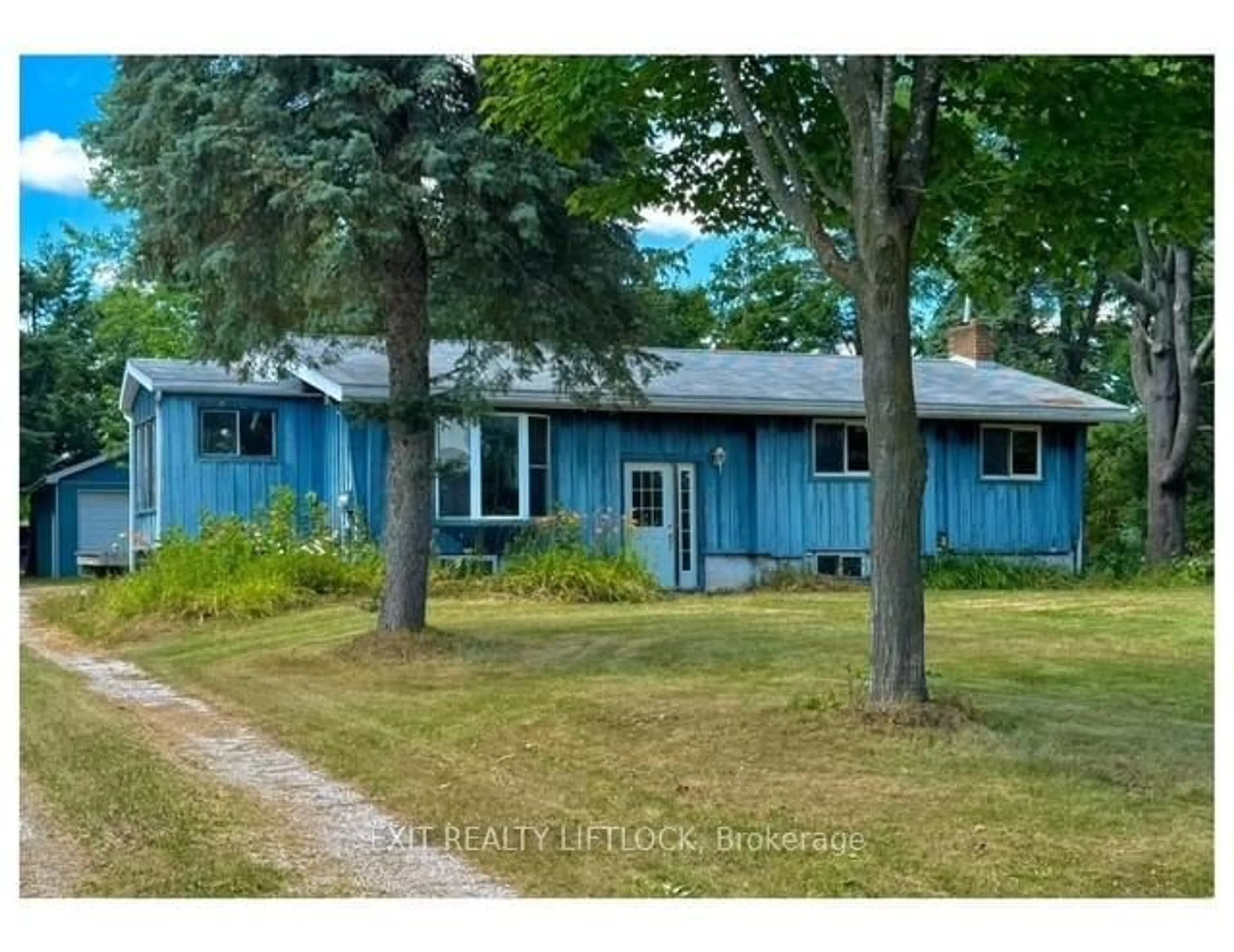 A pic from outside/outdoor area/front of a property/back of a property/a pic from drone, street for 102 Ridge Rd, Oro-Medonte Ontario L0L 2E0