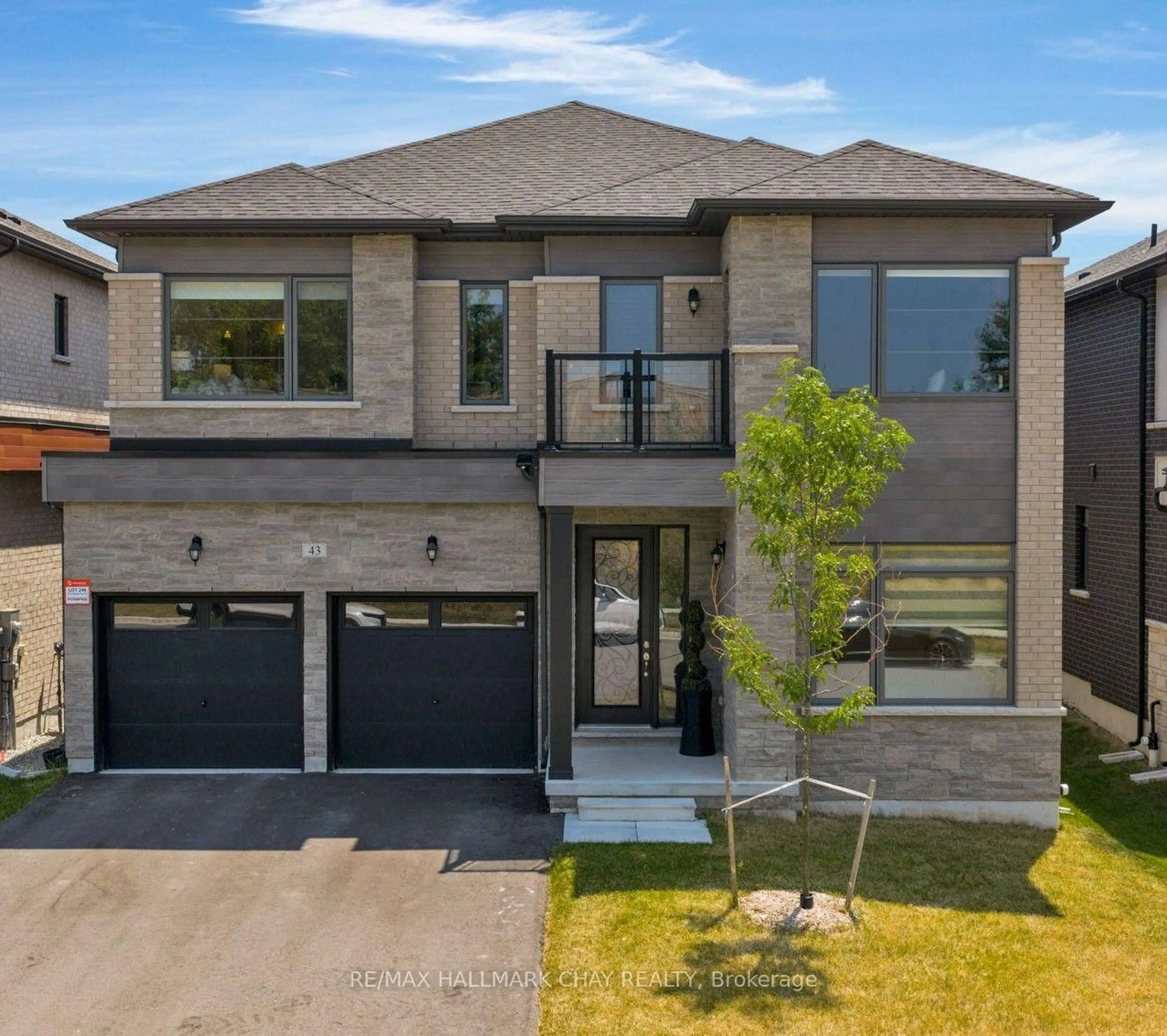 Home with brick exterior material, street for 43 Calypso Ave, Springwater Ontario L0L 1Y3