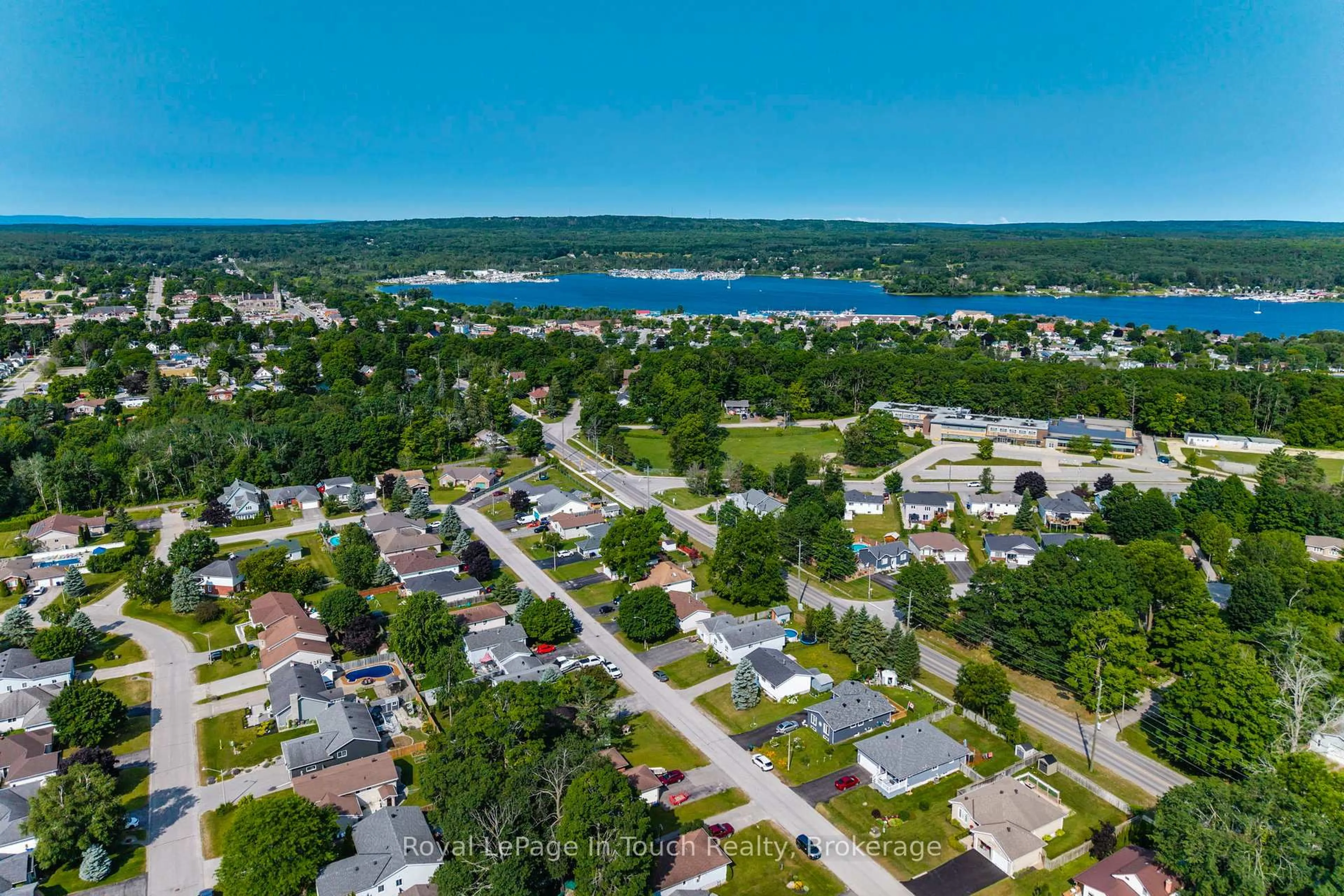 A pic from outside/outdoor area/front of a property/back of a property/a pic from drone, water/lake/river/ocean view for 32 Bridle Rd, Penetanguishene Ontario L9M 1J5