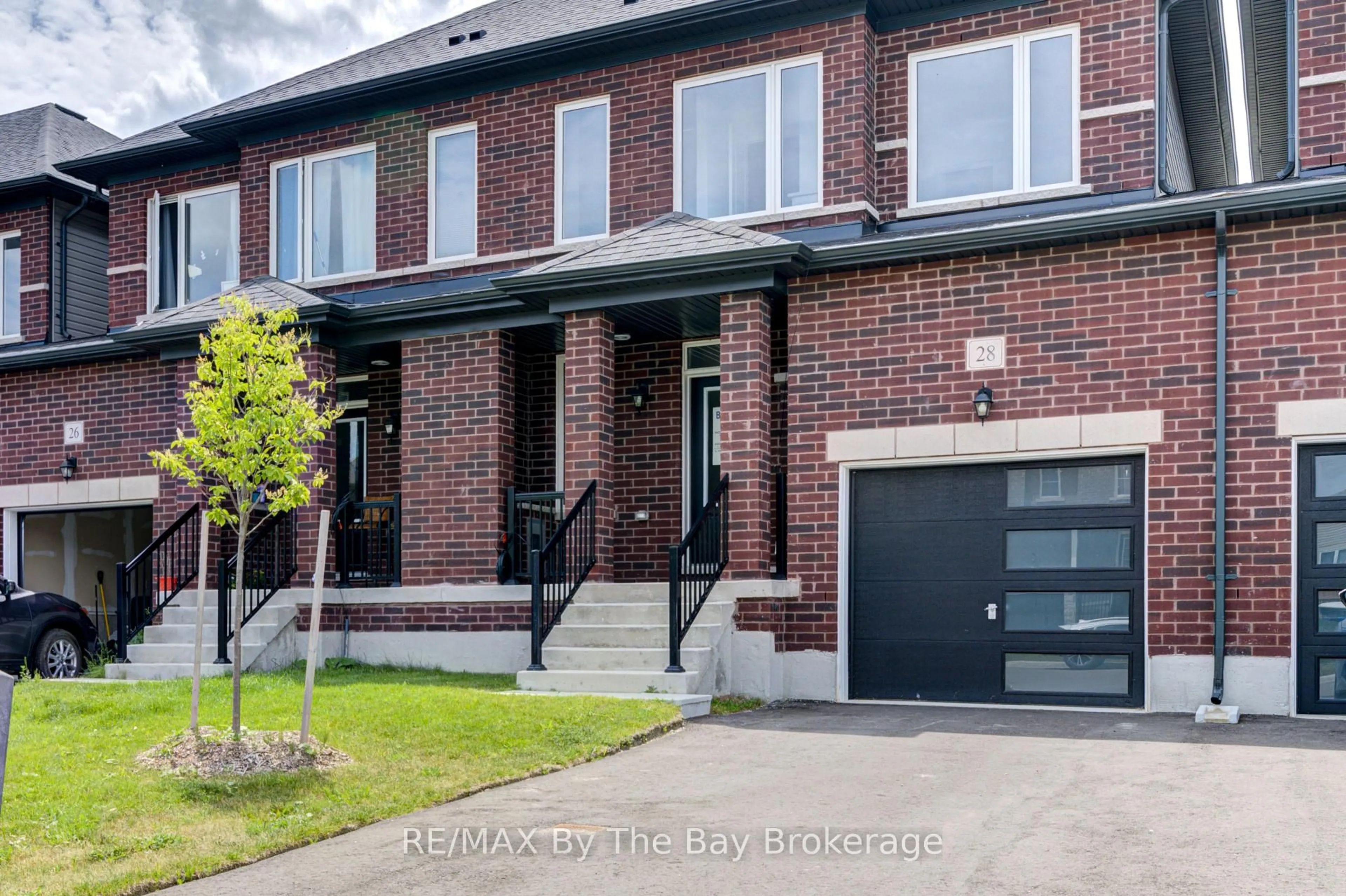 Home with brick exterior material, street for 28 Autumn Dr, Wasaga Beach Ontario L9Z 0K7