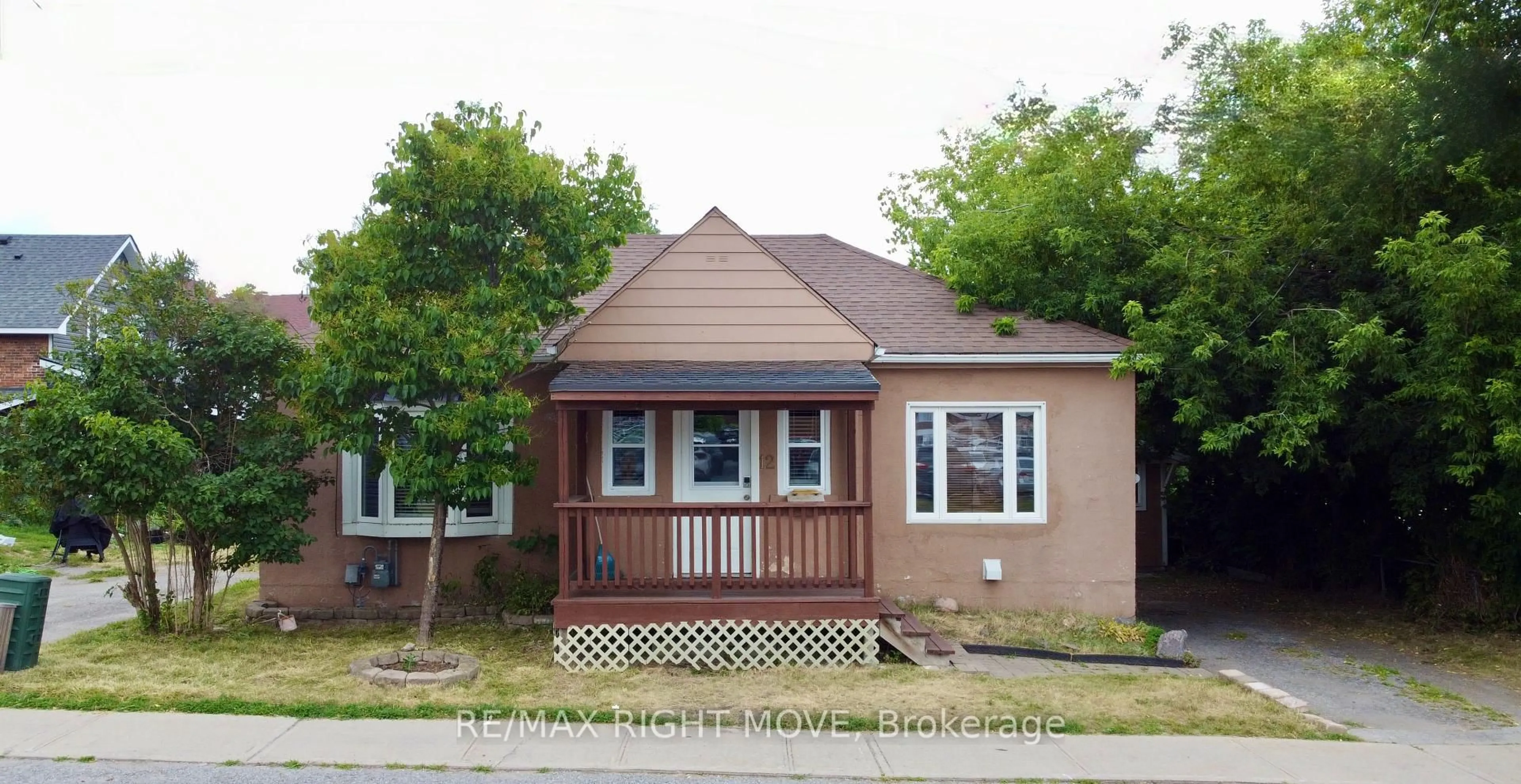 Home with vinyl exterior material, street for 12 Dunlop St, Orillia Ontario L3V 5N9