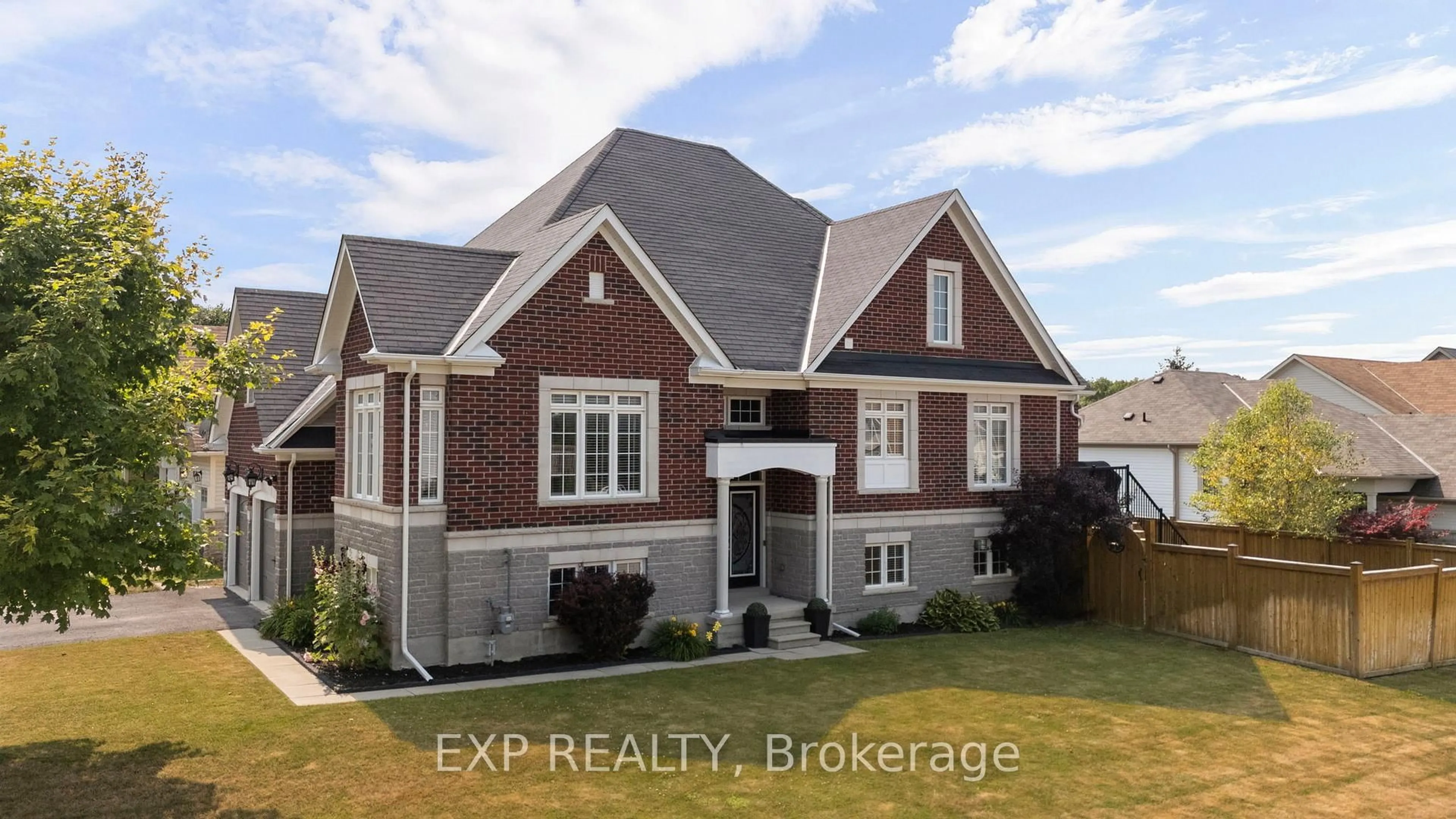 Home with brick exterior material, street for 105 White Sands Way, Wasaga Beach Ontario L9Z 0E2