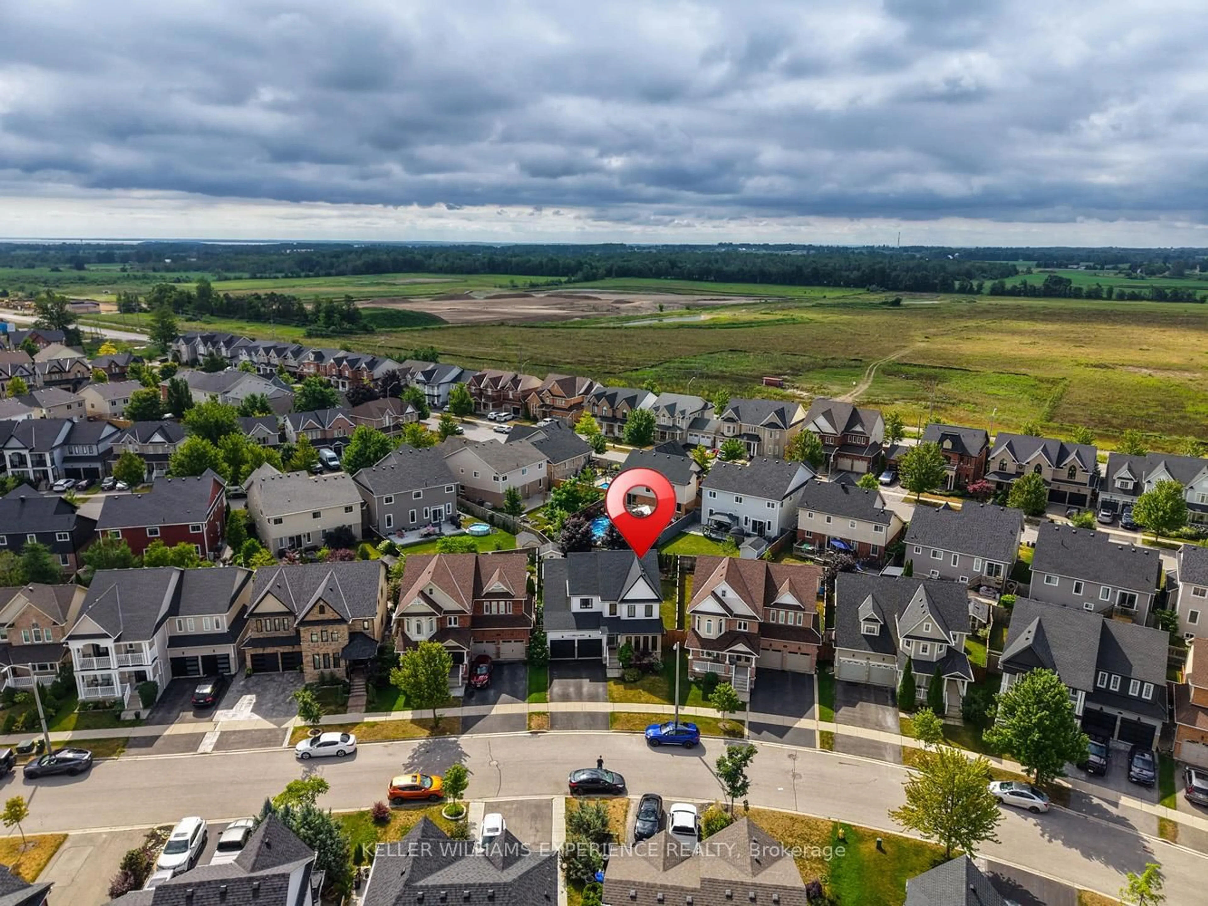 A pic from outside/outdoor area/front of a property/back of a property/a pic from drone, mountain view for 13 Counsellor Terr, Barrie Ontario L4M 7H1