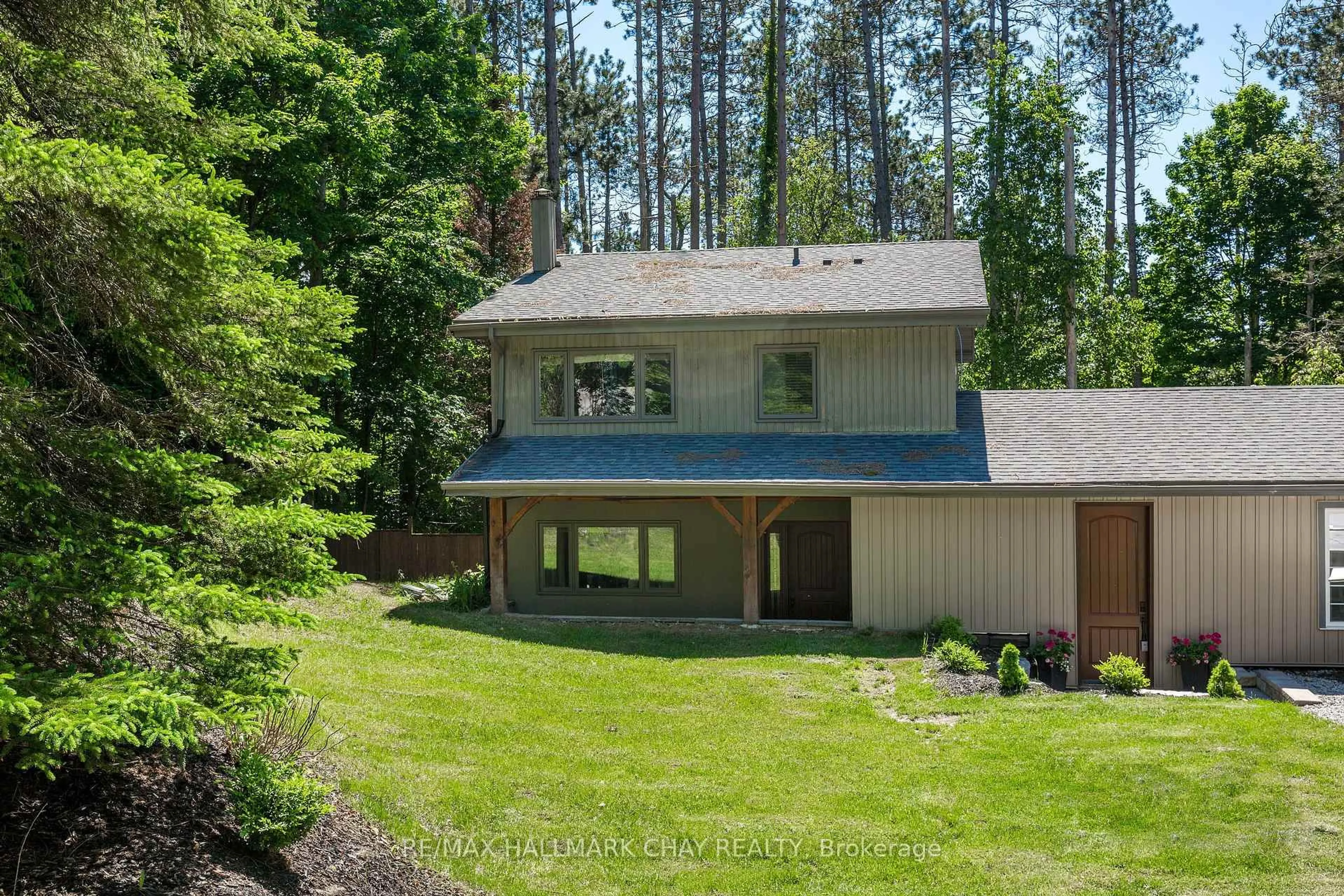 A pic from outside/outdoor area/front of a property/back of a property/a pic from drone, forest/trees view for 1 Pine Spring, Oro-Medonte Ontario L4M 4Y8