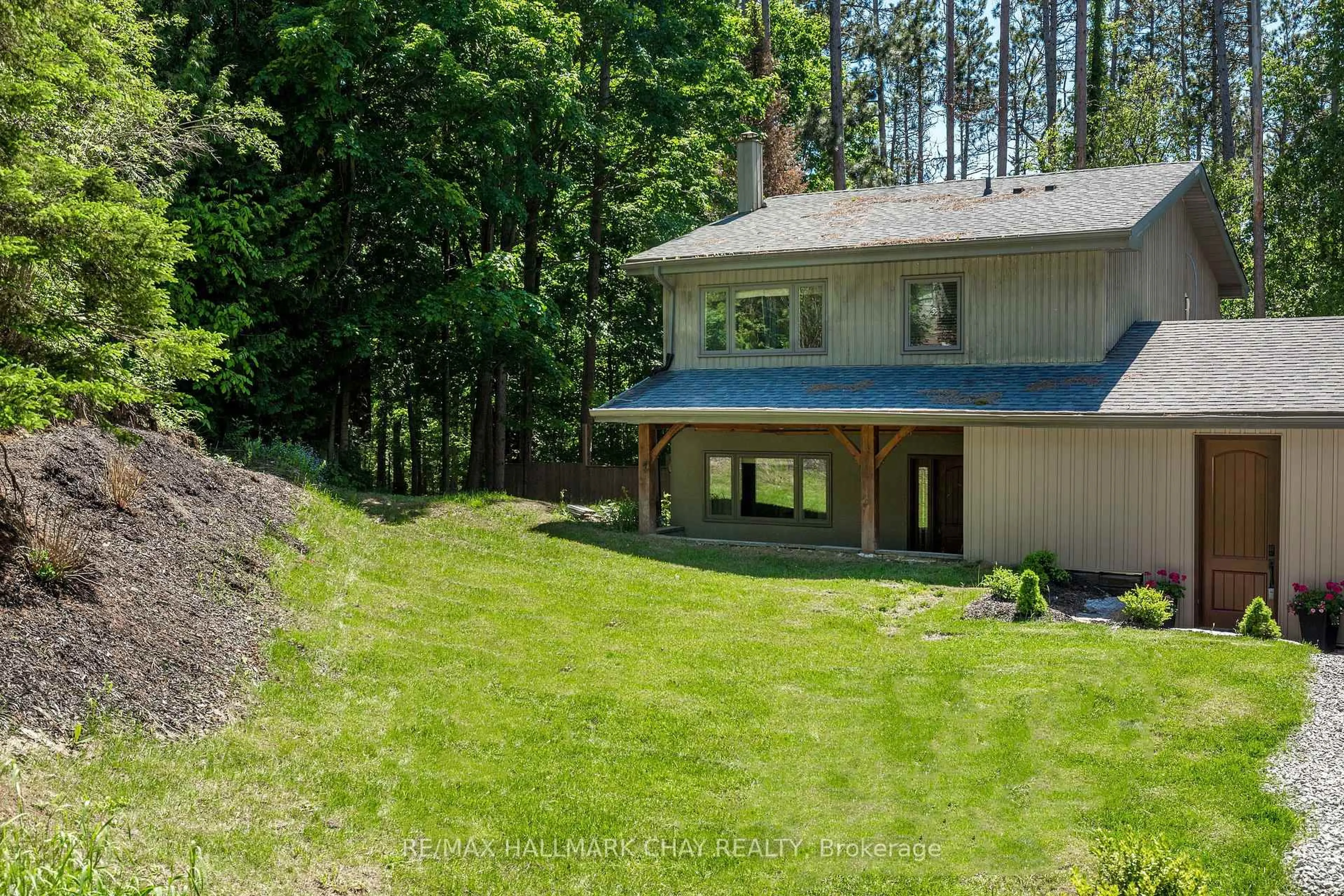 A pic from outside/outdoor area/front of a property/back of a property/a pic from drone, forest/trees view for 1 Pine Spring, Oro-Medonte Ontario L4M 4Y8