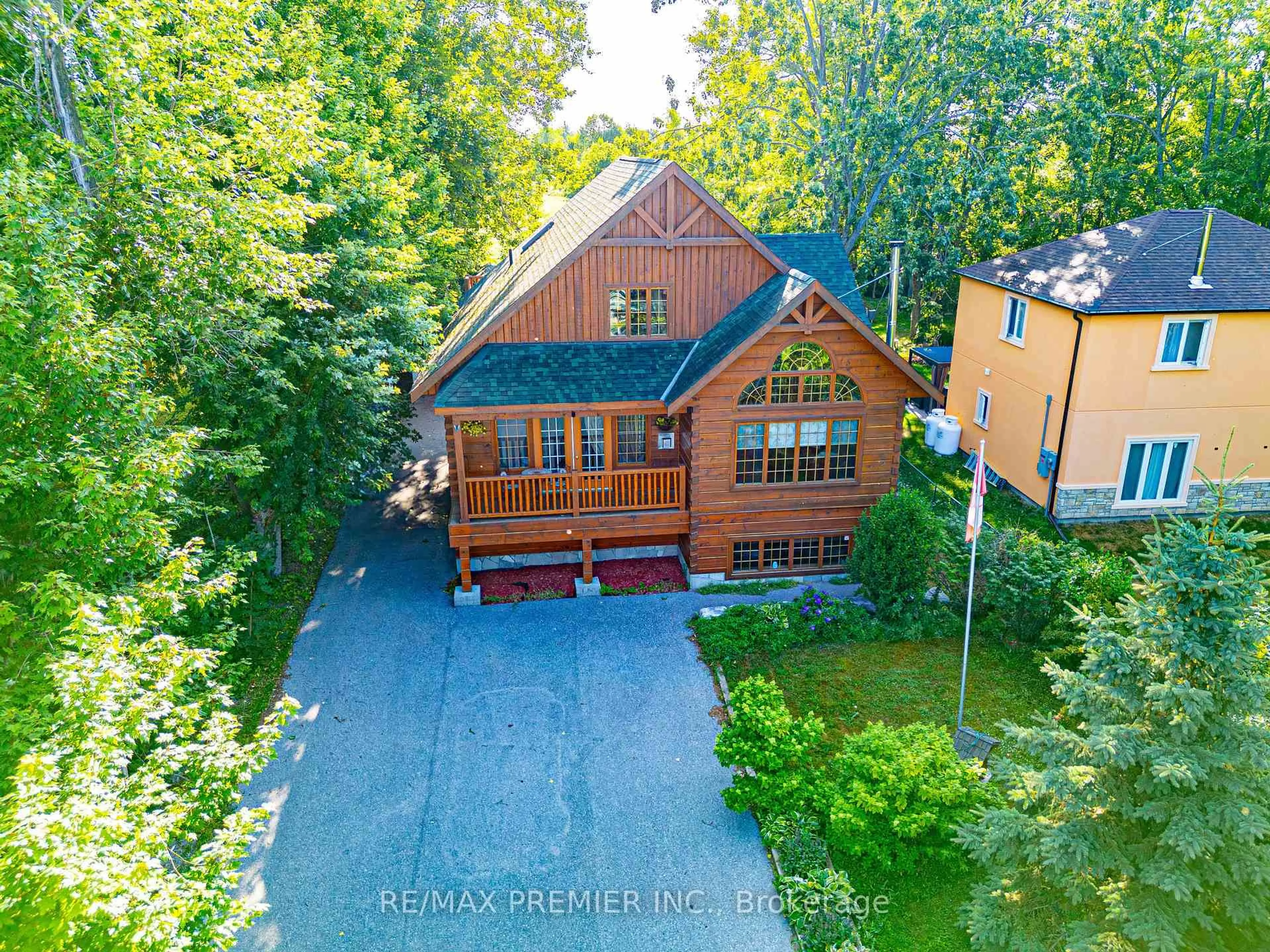 A pic from outside/outdoor area/front of a property/back of a property/a pic from drone, unknown for 2441 Lakeshore Dr, Ramara Ontario L0K 1B0