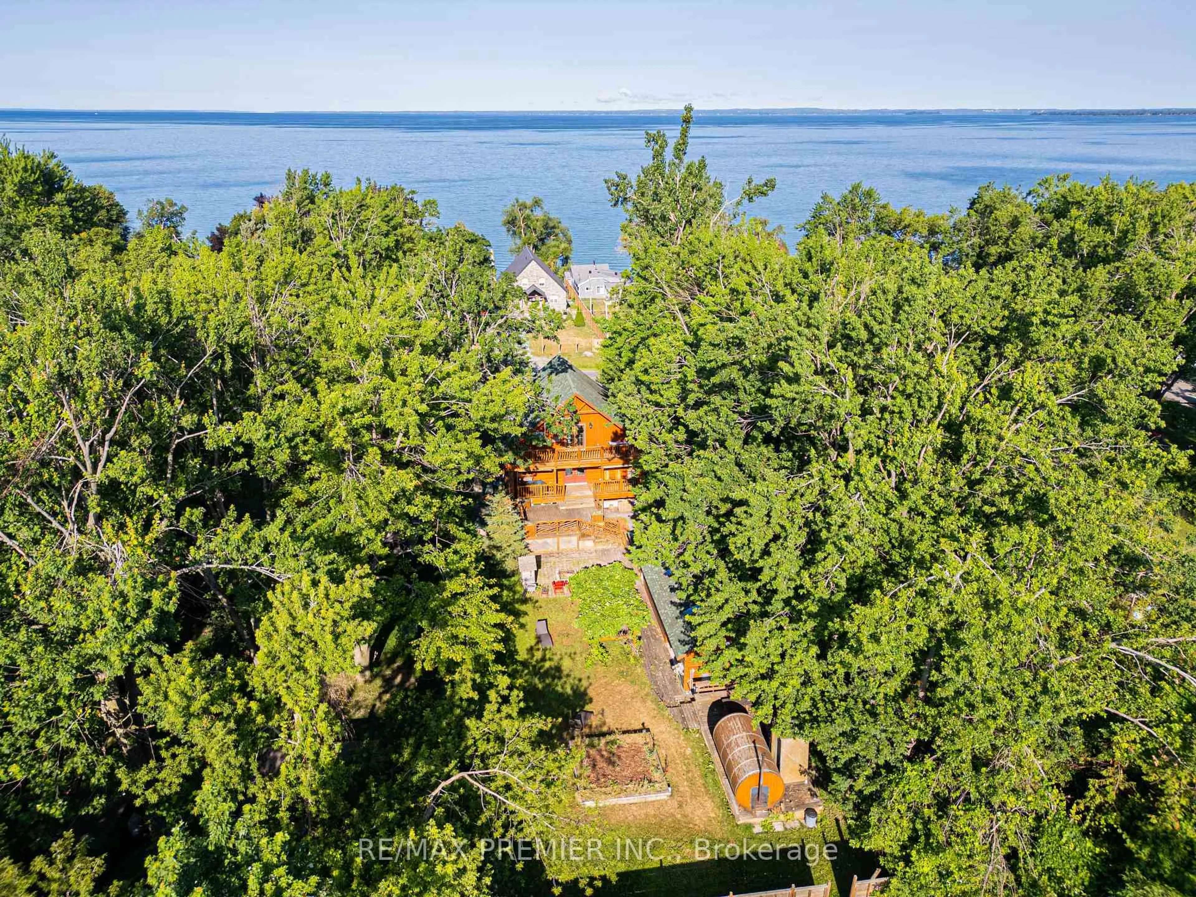 A pic from outside/outdoor area/front of a property/back of a property/a pic from drone, water/lake/river/ocean view for 2441 Lakeshore Dr, Ramara Ontario L0K 1B0