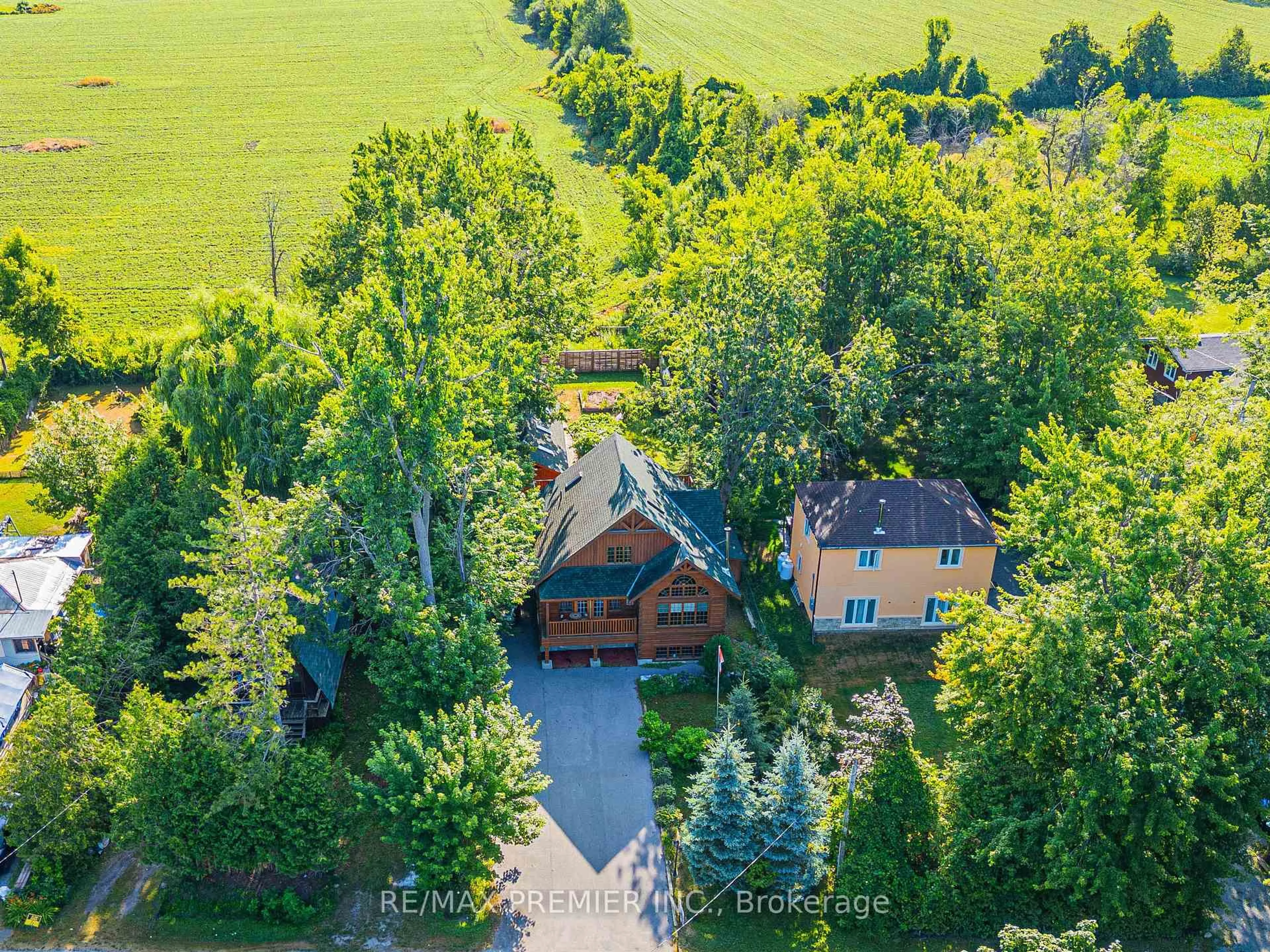 A pic from outside/outdoor area/front of a property/back of a property/a pic from drone, unknown for 2441 Lakeshore Dr, Ramara Ontario L0K 1B0